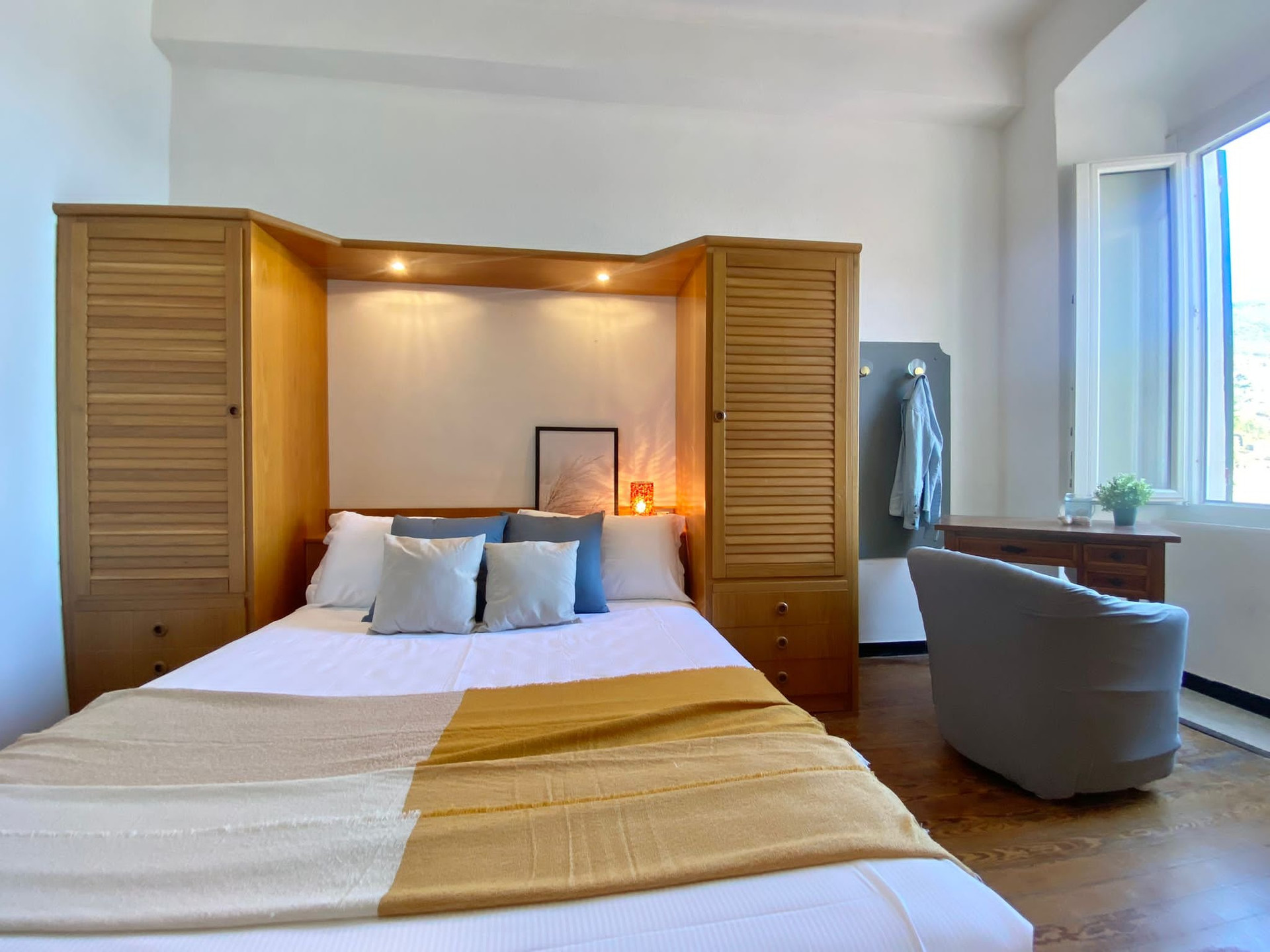 Master bedroom with wooden wardrobe
