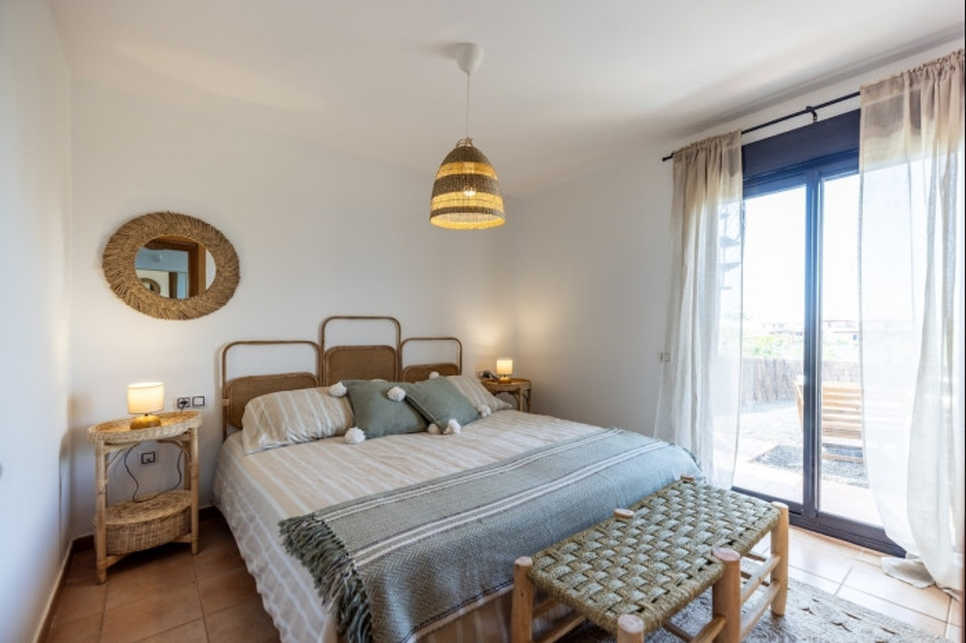 Cozy bedroom with rattan decor