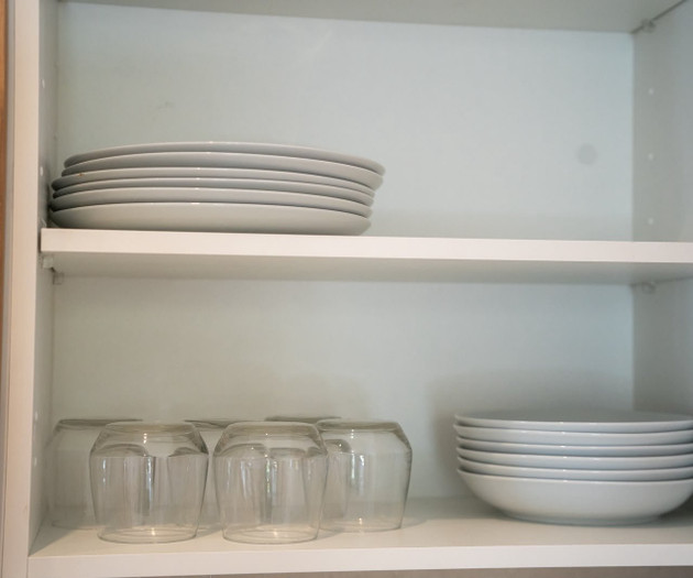 Kitchen cabinet with dishware