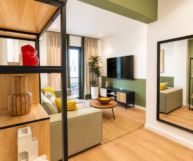 Living room with mirror and shelving
