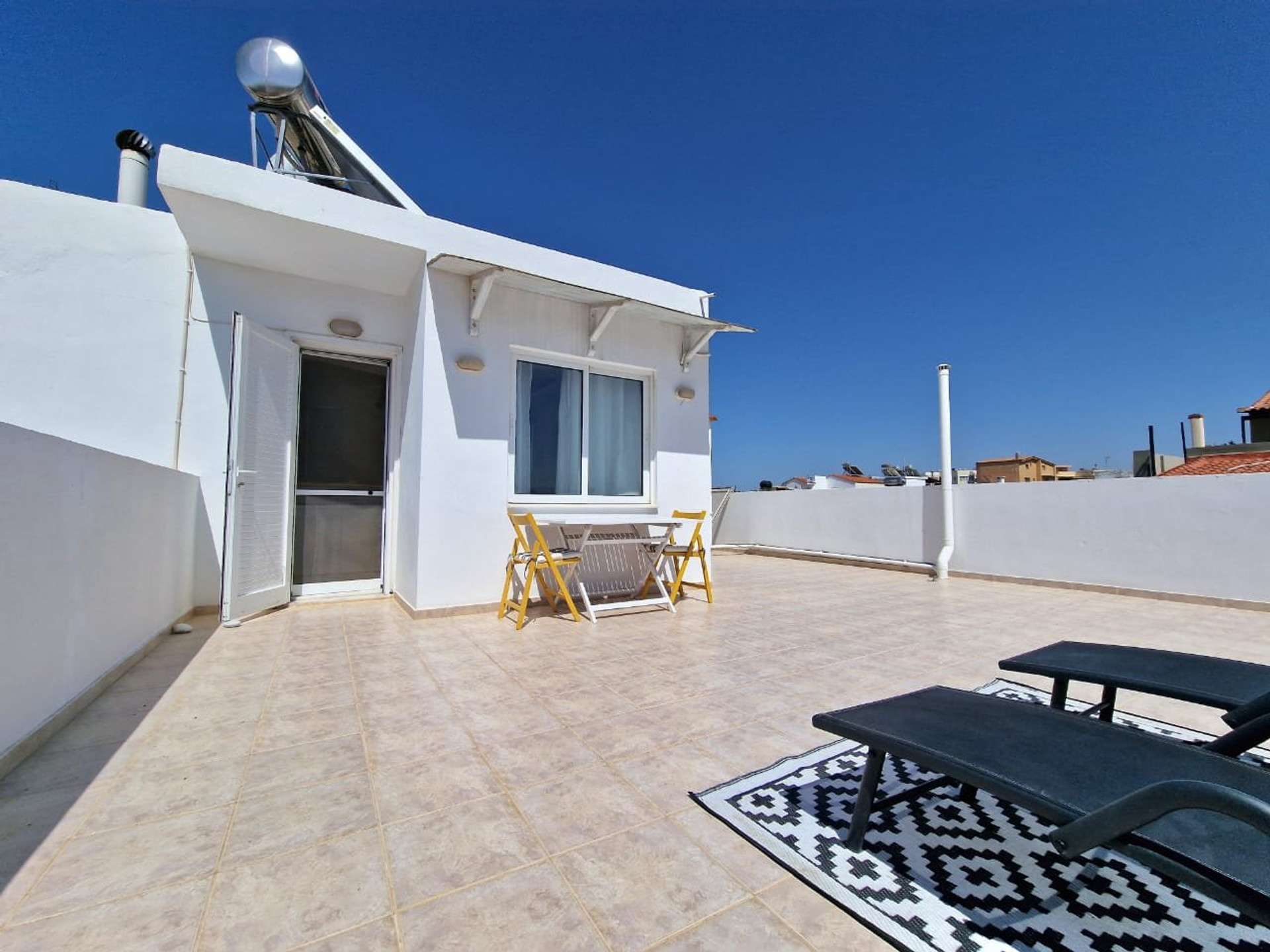 Rooftop terrace with seating area