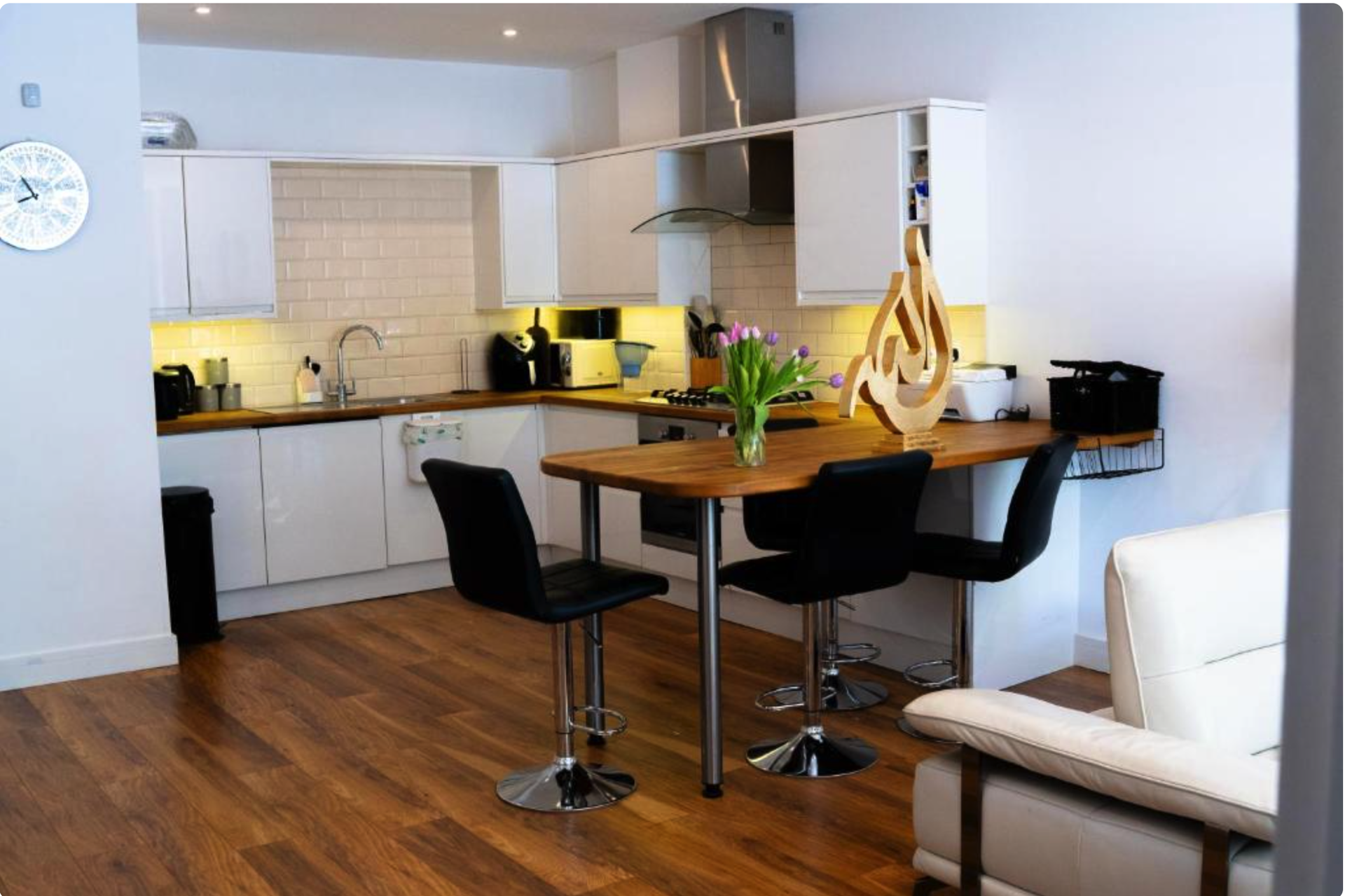 Open-plan kitchen with breakfast bar
