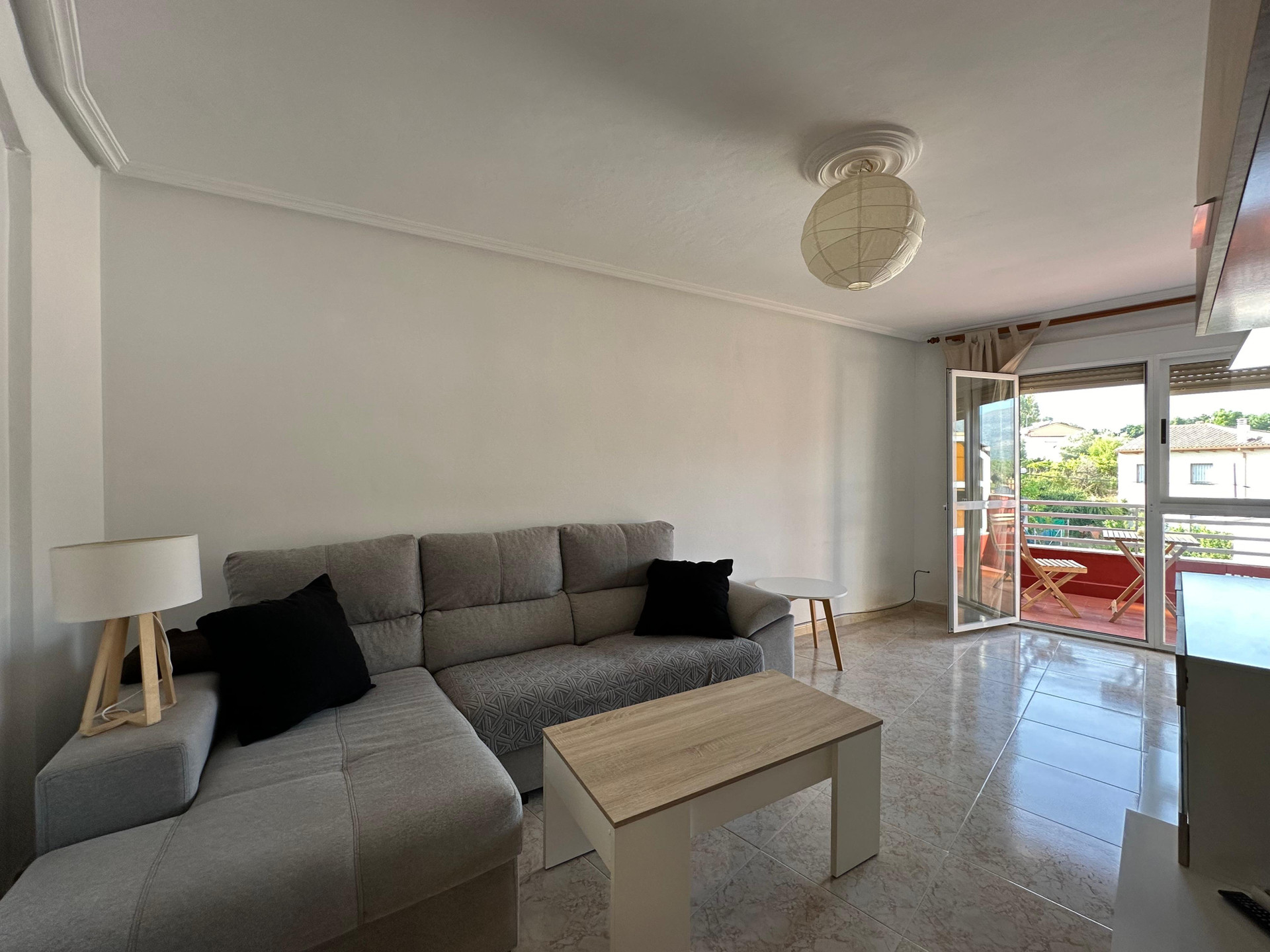Living room with balcony access