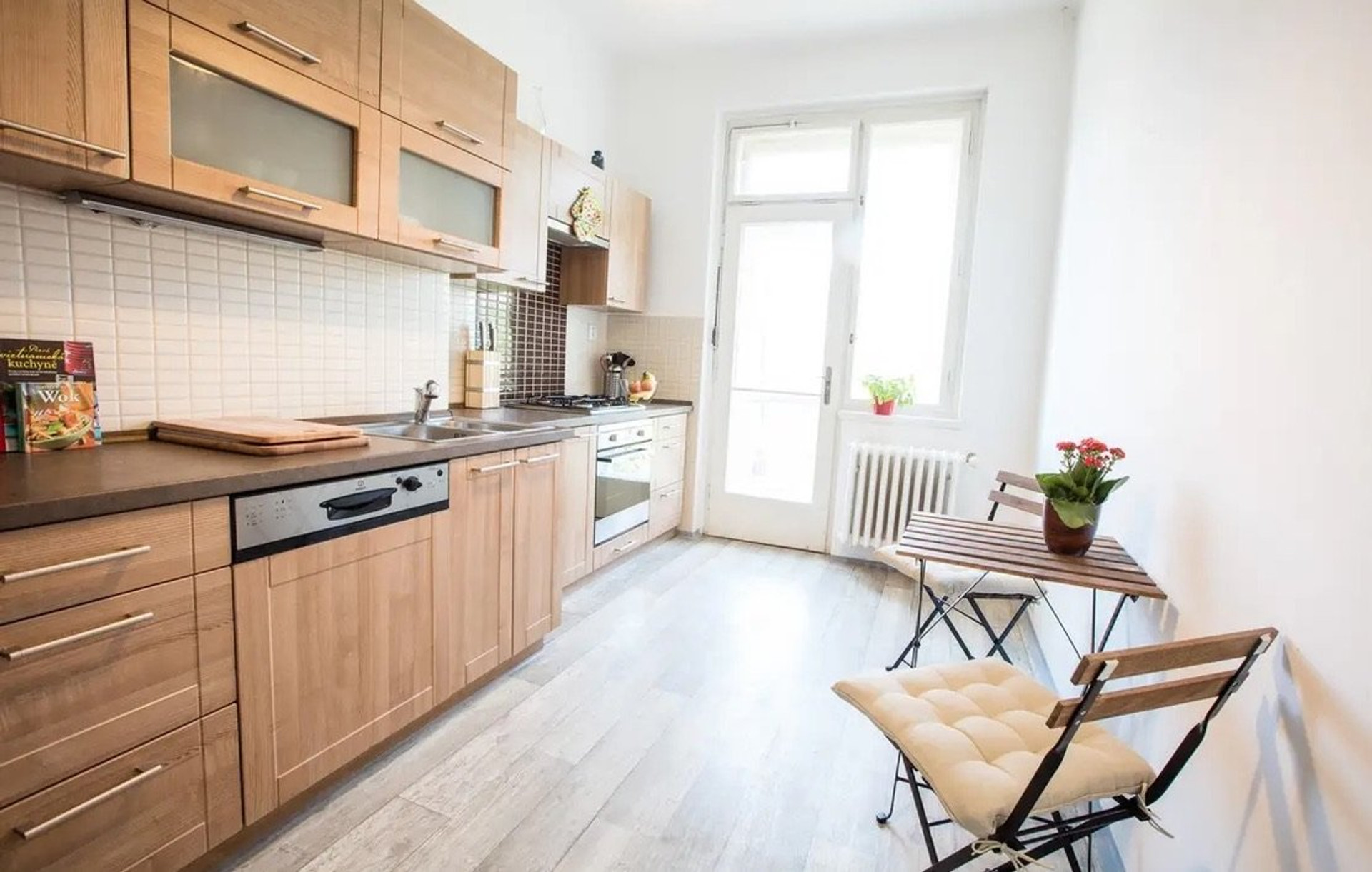 Kitchen with wooden cabinets and table