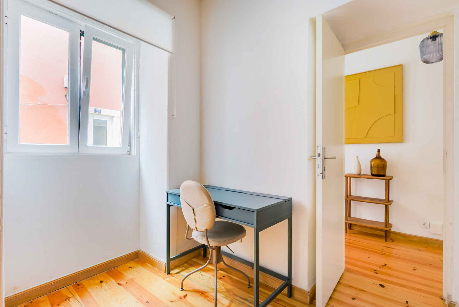 Work Space in the Bedroom with a single bed