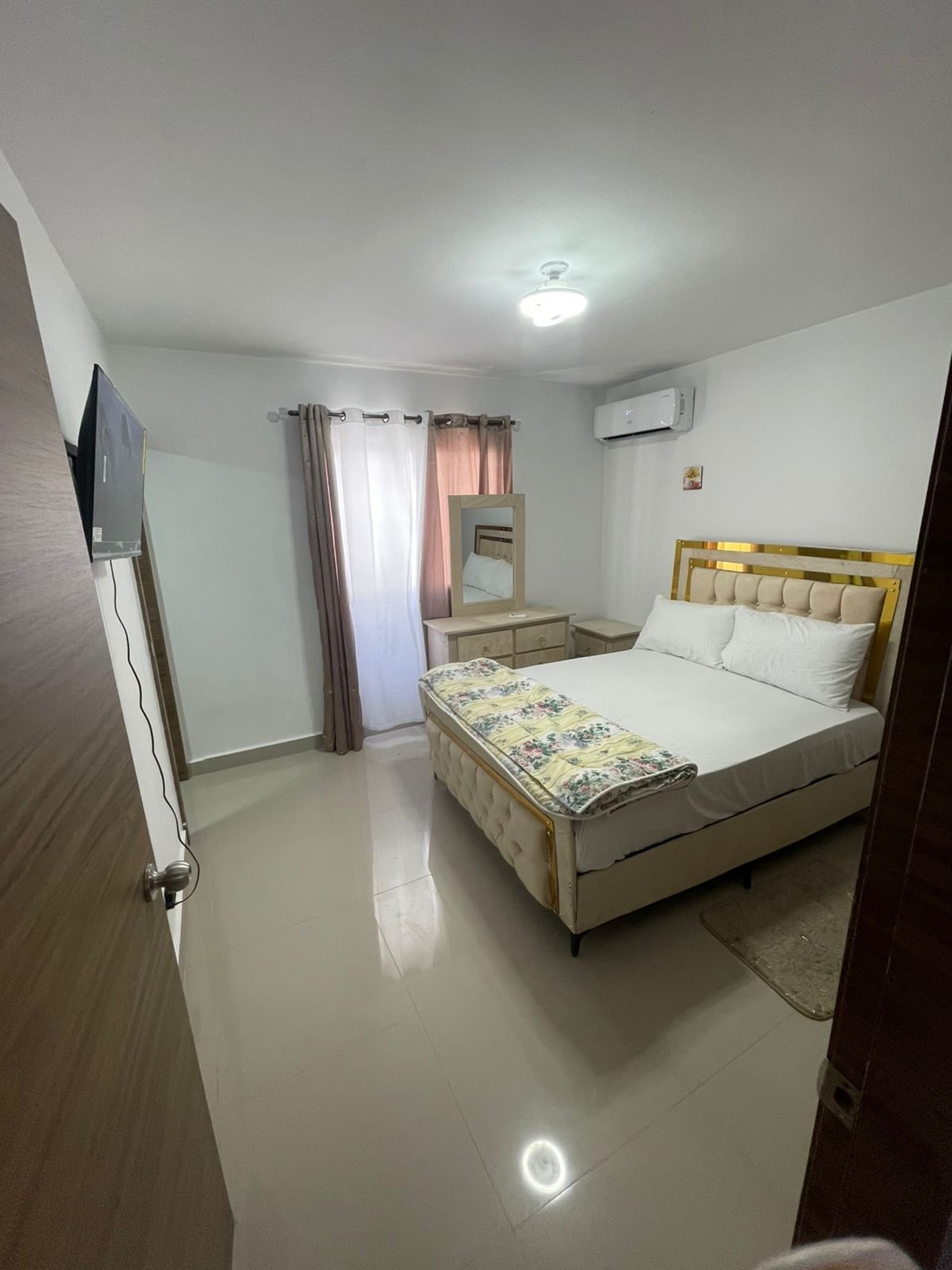 Master bedroom with queen bed