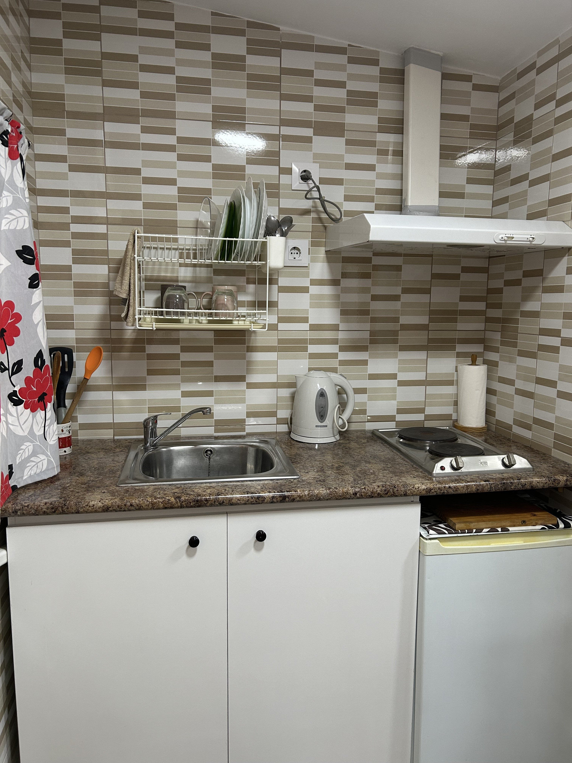 Compact kitchenette with stove