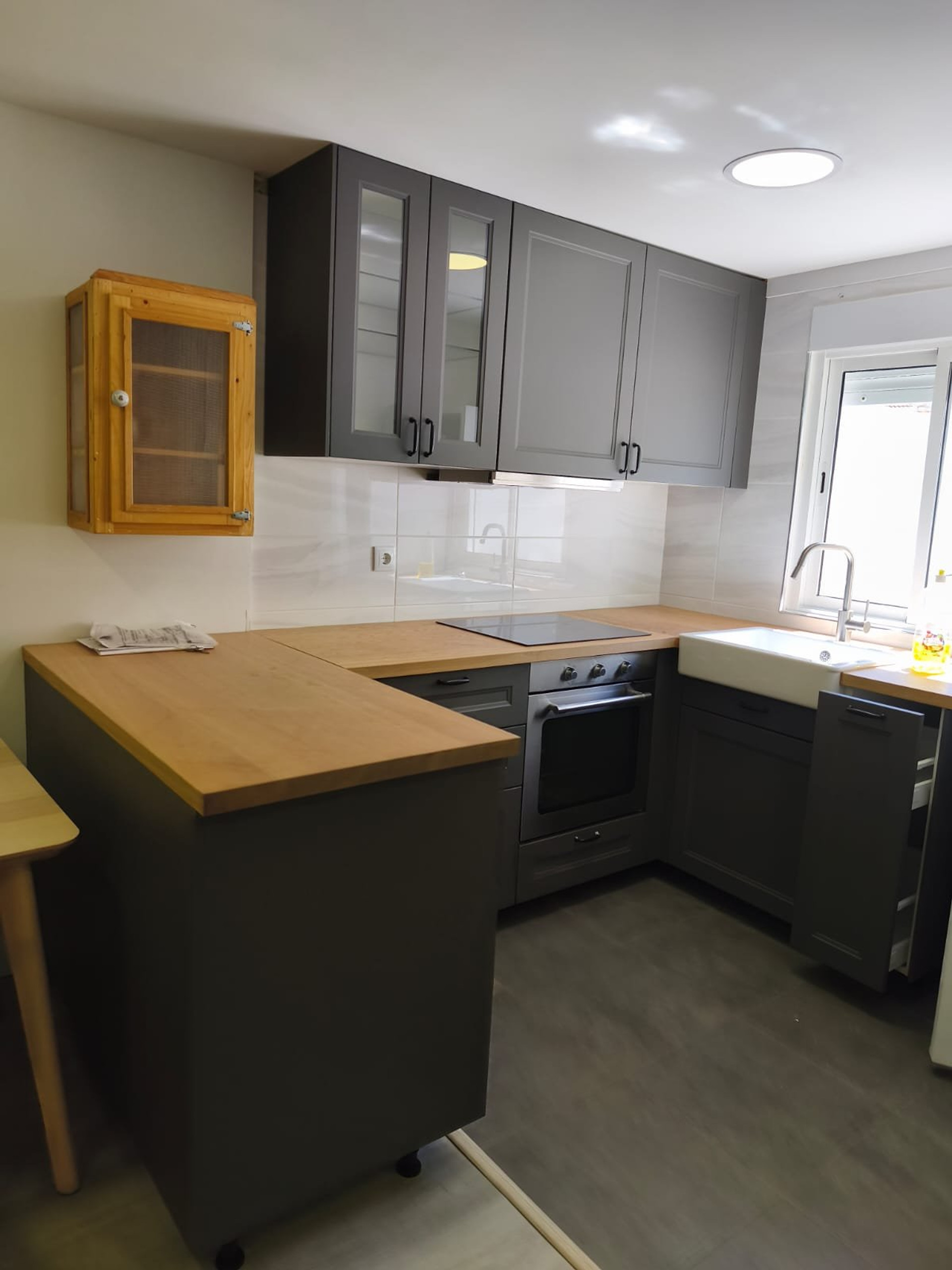 Modern kitchen with gray cabinets