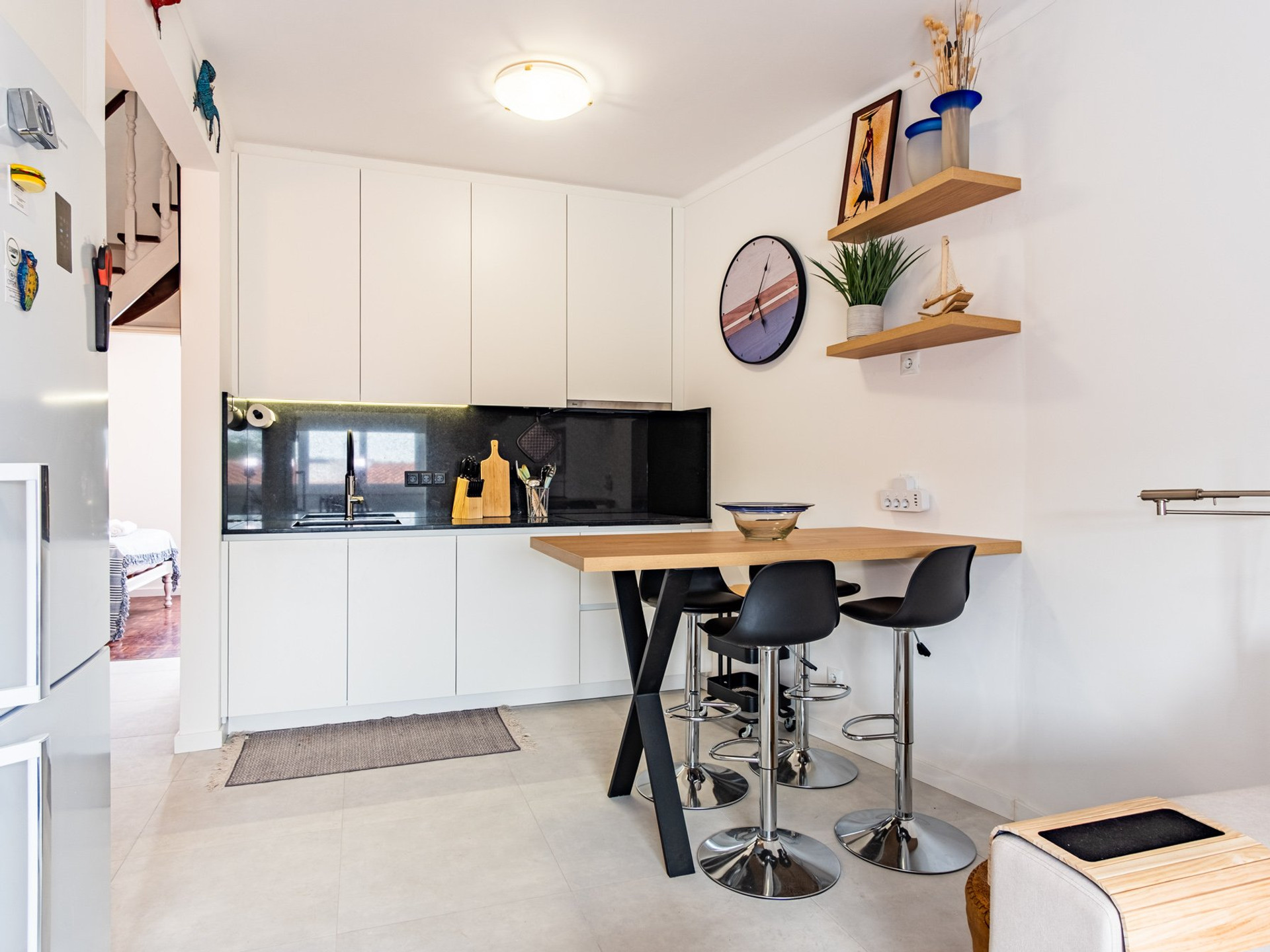 Modern kitchen with bar dining table