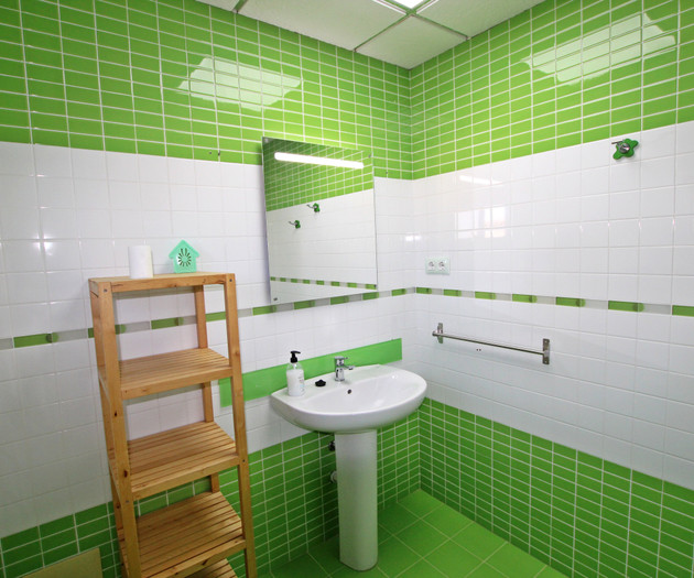Green bathroom with sink
