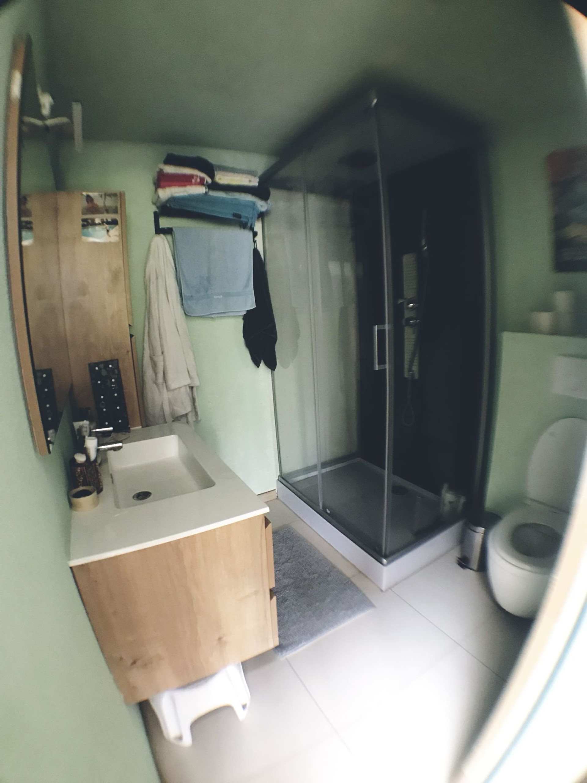 Bathroom with shower and vanity