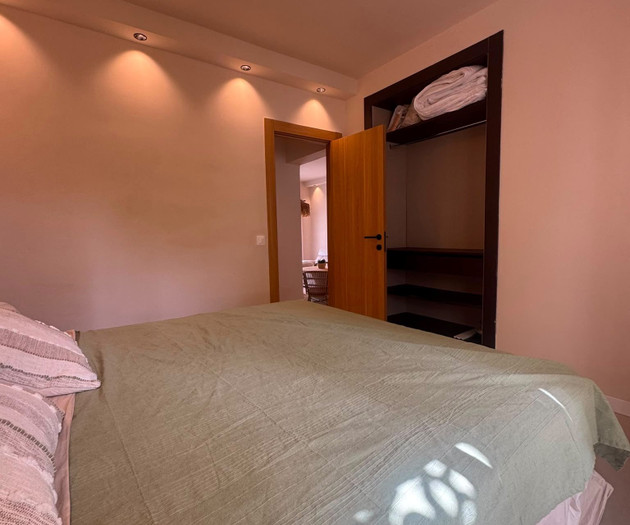 Bedroom with open closet