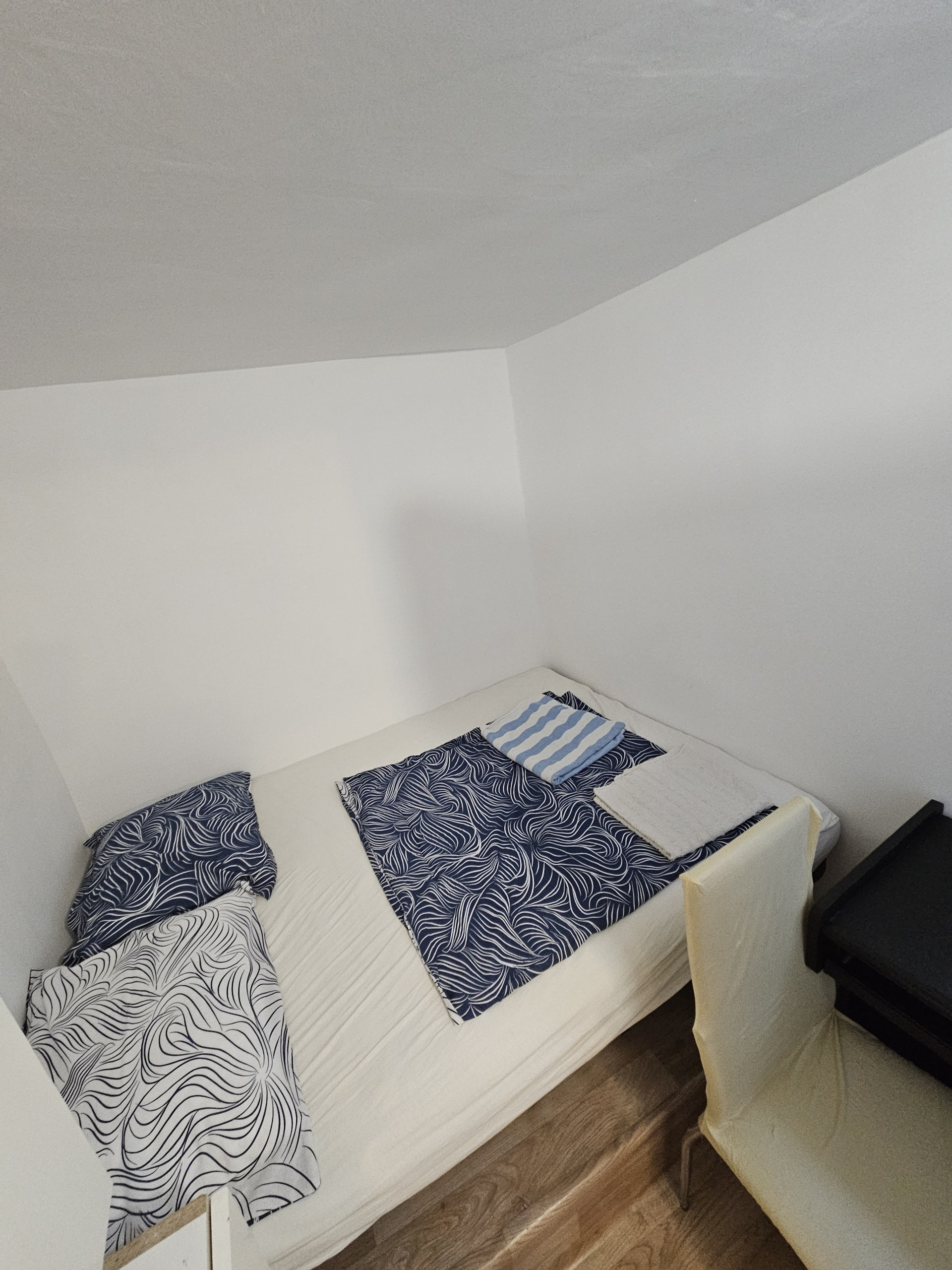 Bedroom overhead view with chair