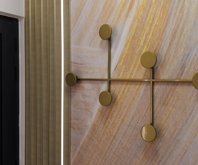 Gold wall hooks detail