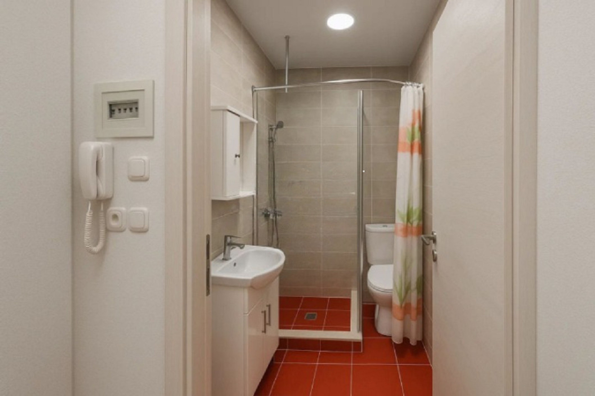 Sparkling clean and modern bathroom with all the essential amenities for a comfortable stay