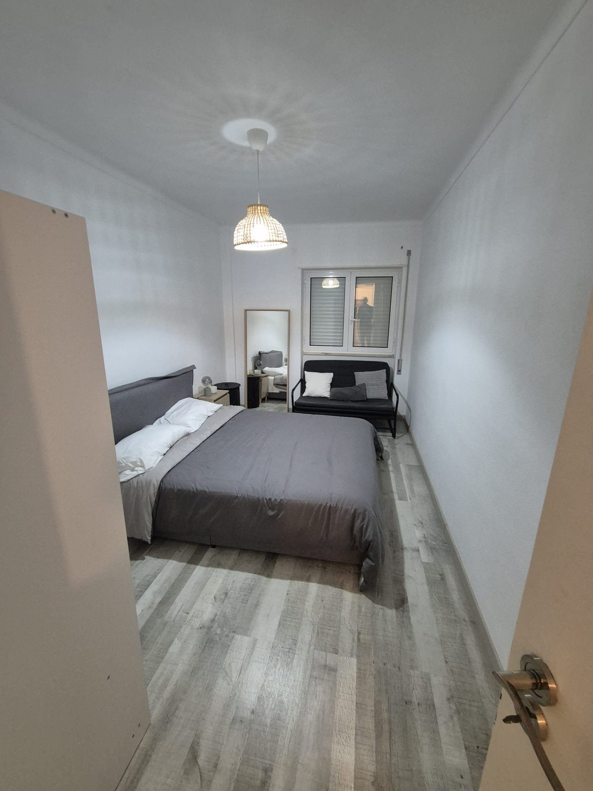 Room 1 with queen bed and sofa bed