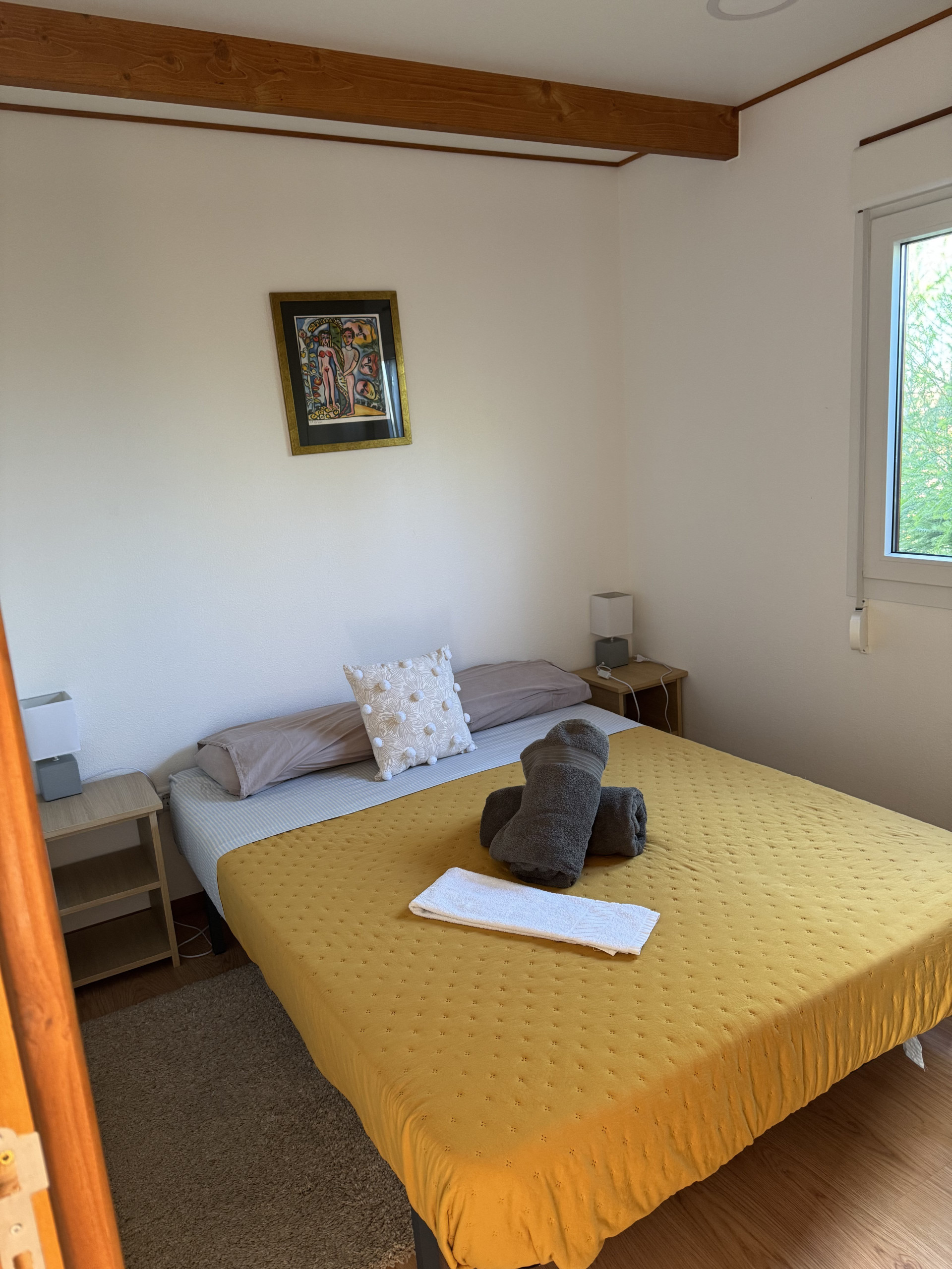 Bedroom with yellow bedspread