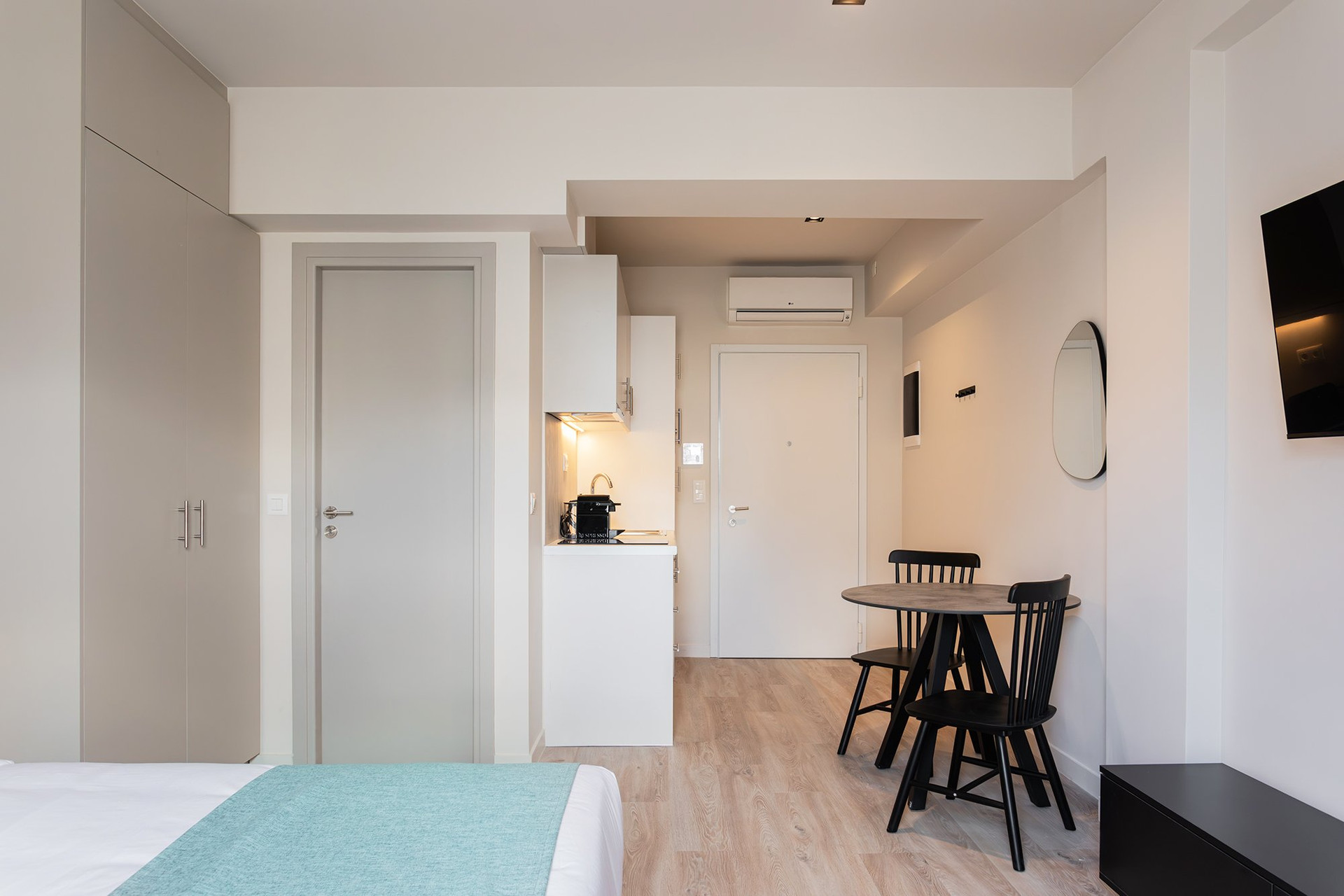 Studio overview with dining and kitchen