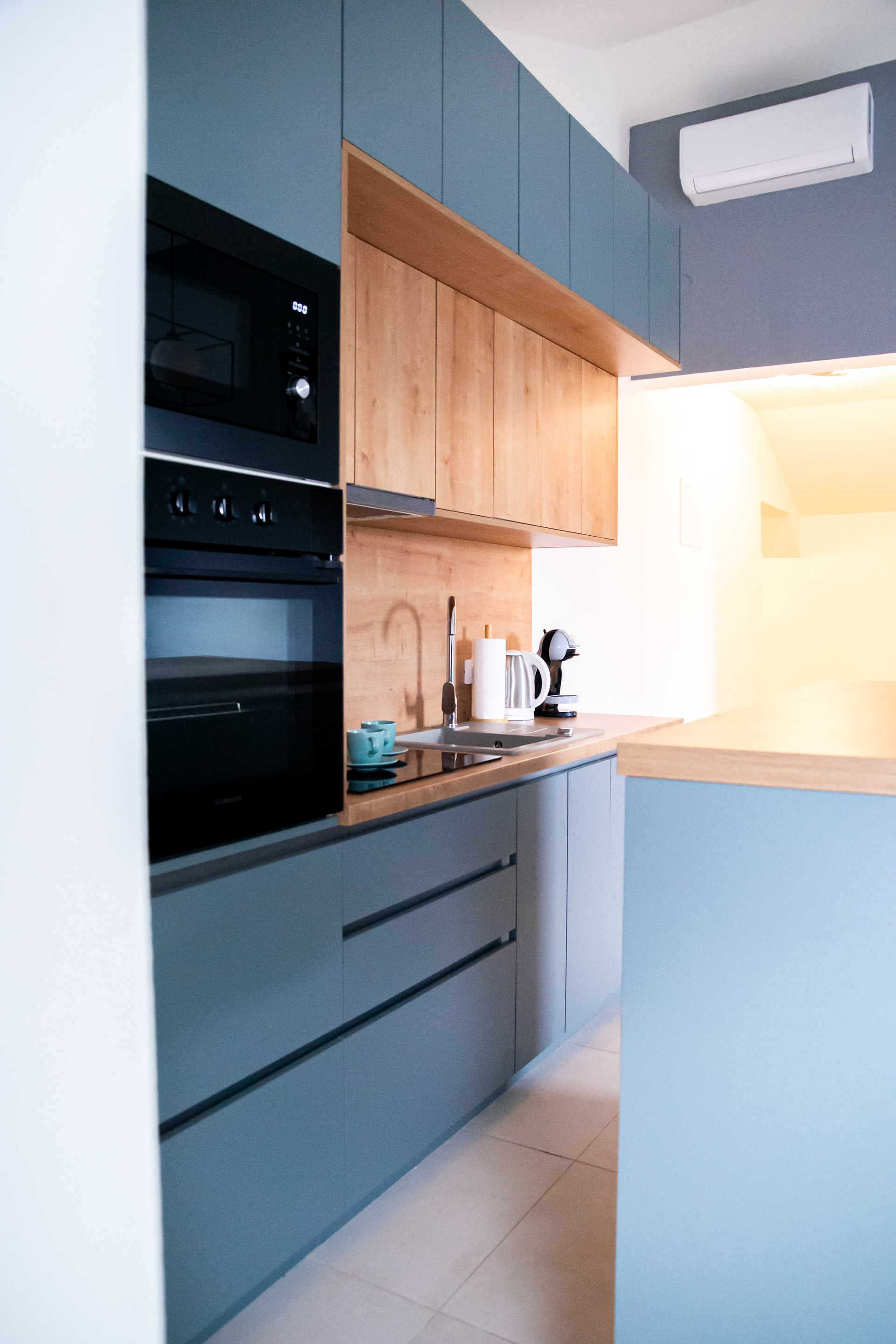 Modern kitchen with wood cabinetry