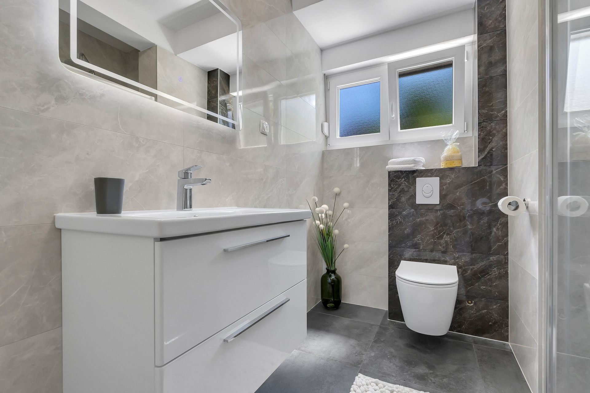 Modern bathroom with toilet sink