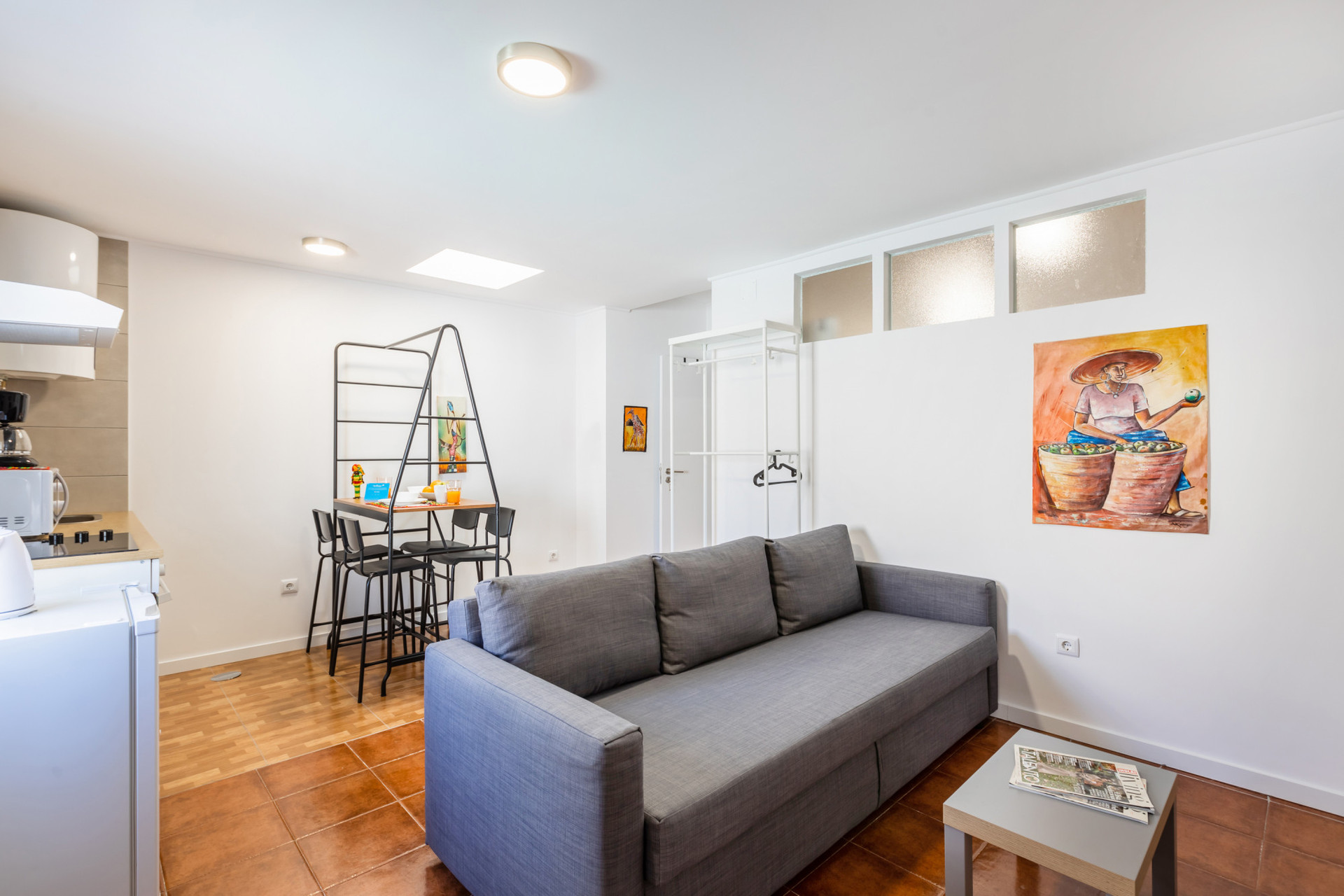 Living Room with Flat-Screen TV and Dining Table