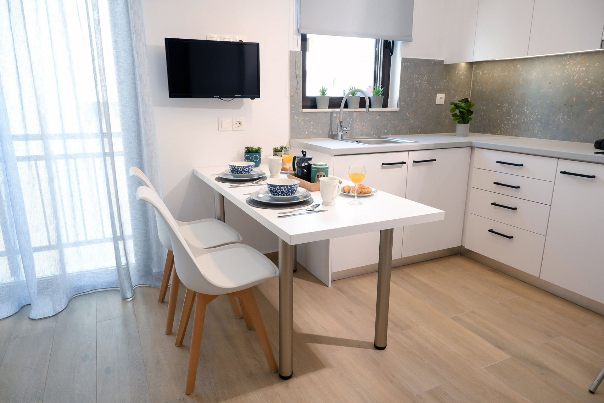 KITCHEN AREA AND TV B10