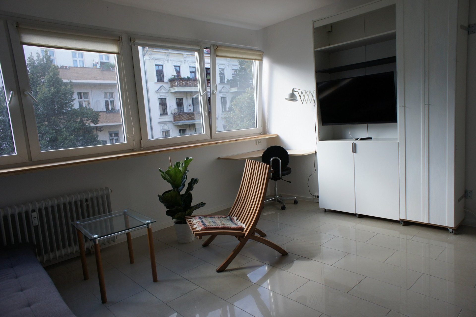 Work space and mobile wardrobe (on rolls)
