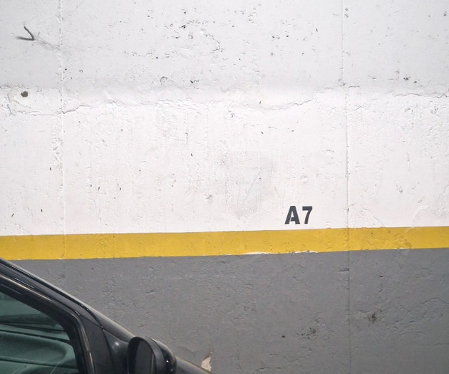 Parking spot number sign
