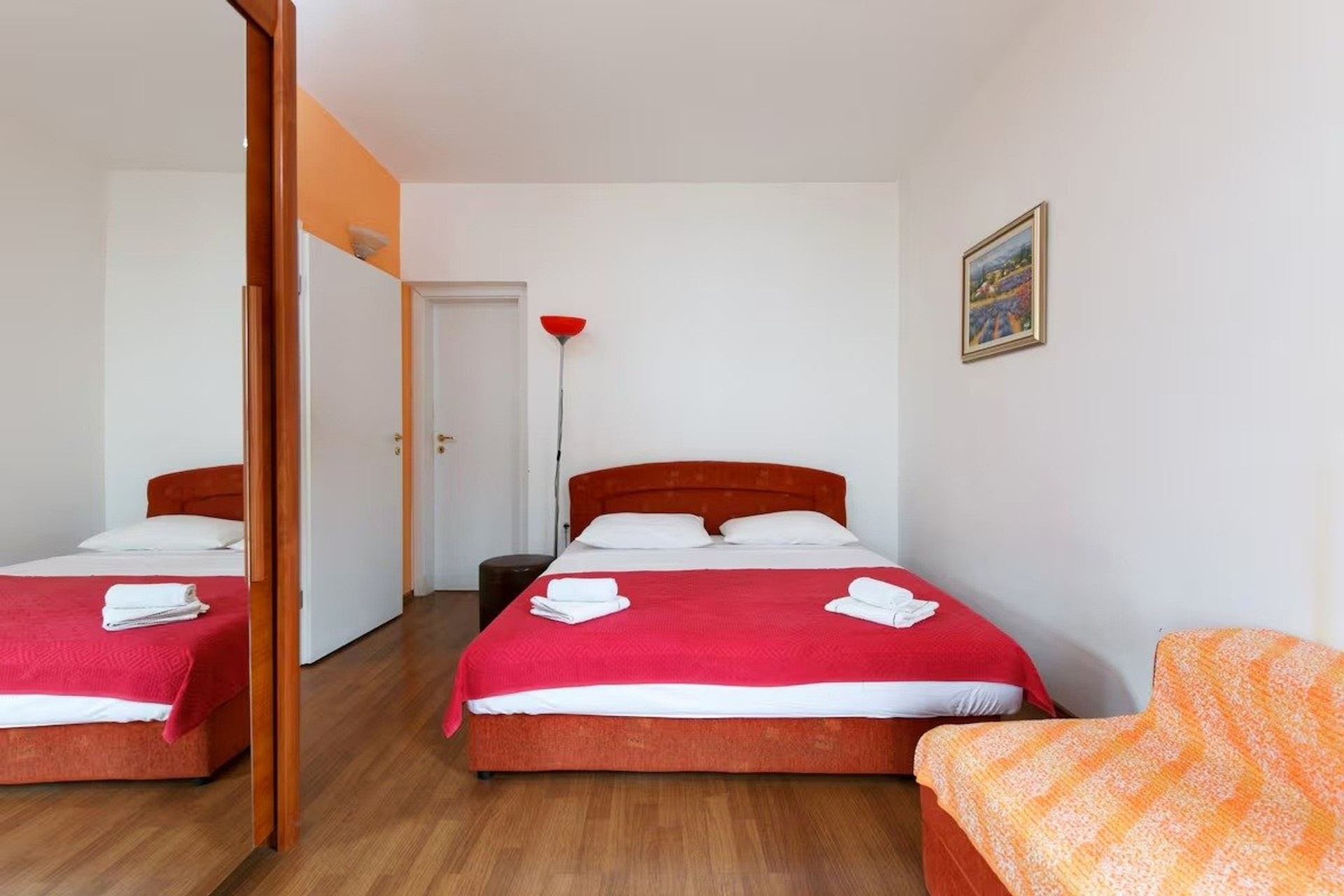 Bedroom with red bedding