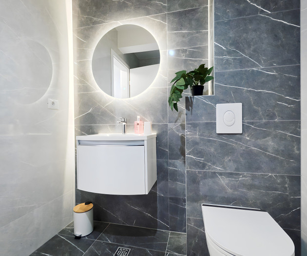 Bathroom with mirror and toilet