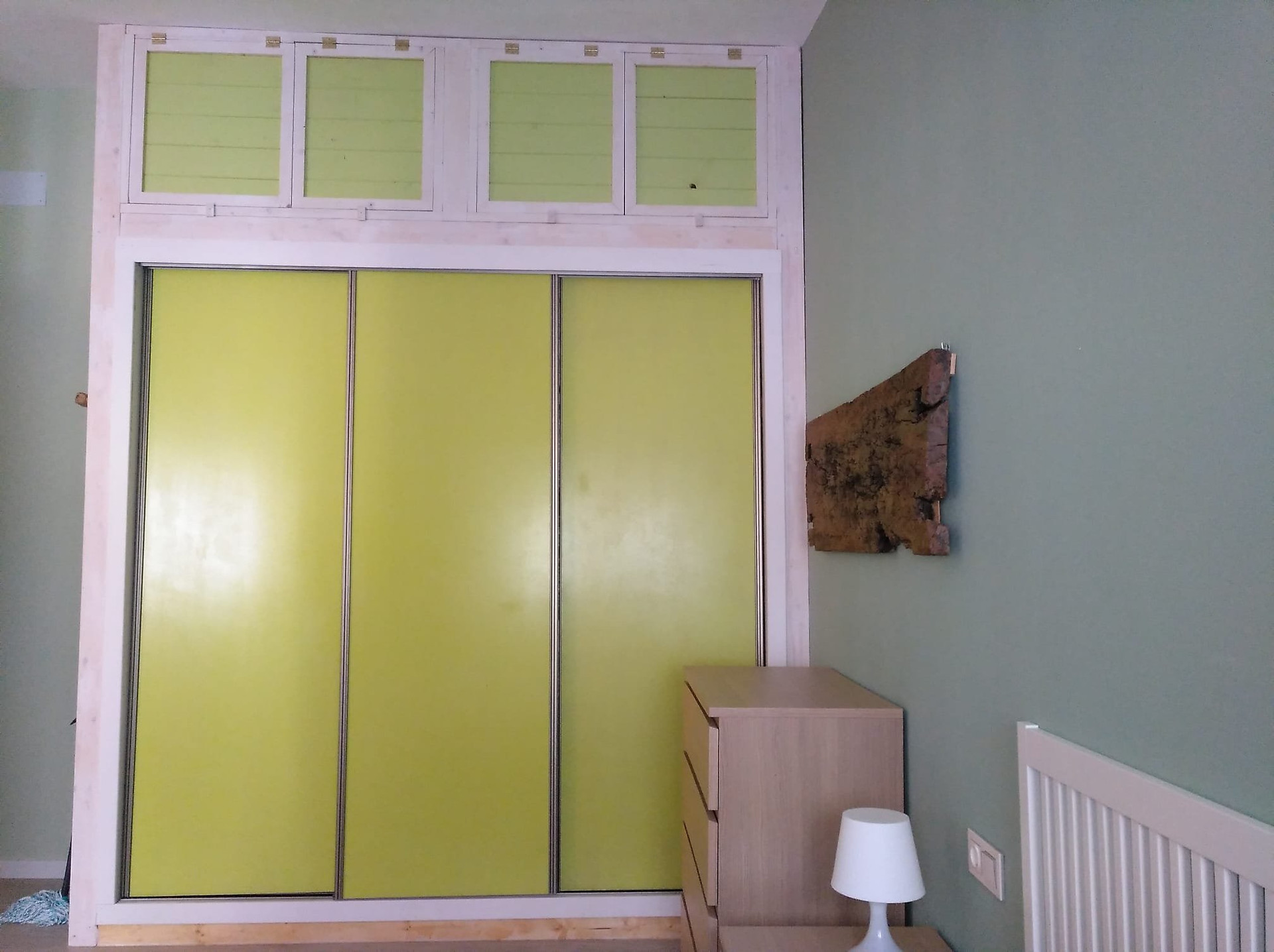 Bedroom with yellow wardrobe