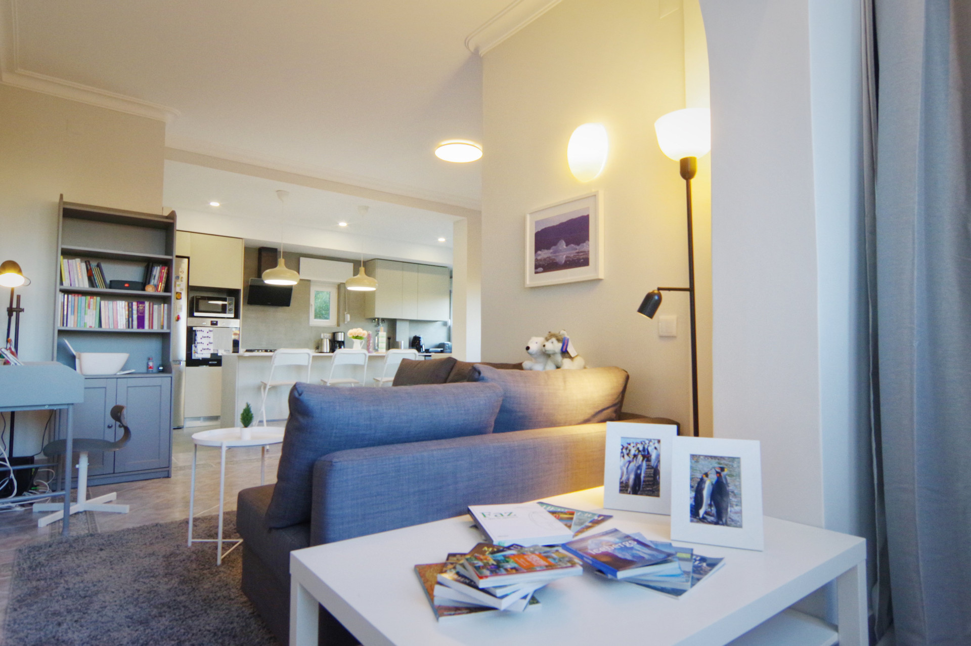 Living room with sofa and kitchen