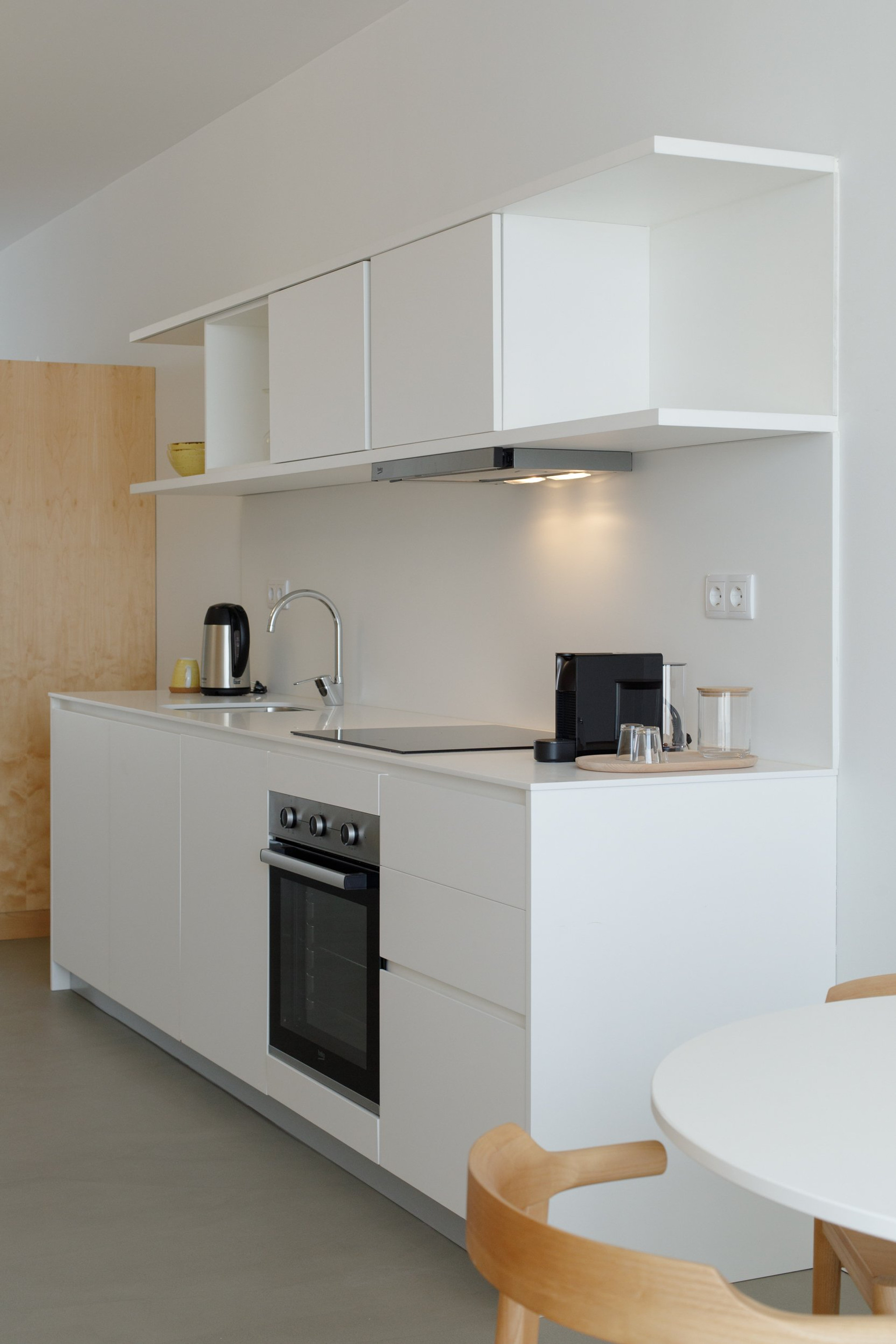 Modern white kitchen with oven