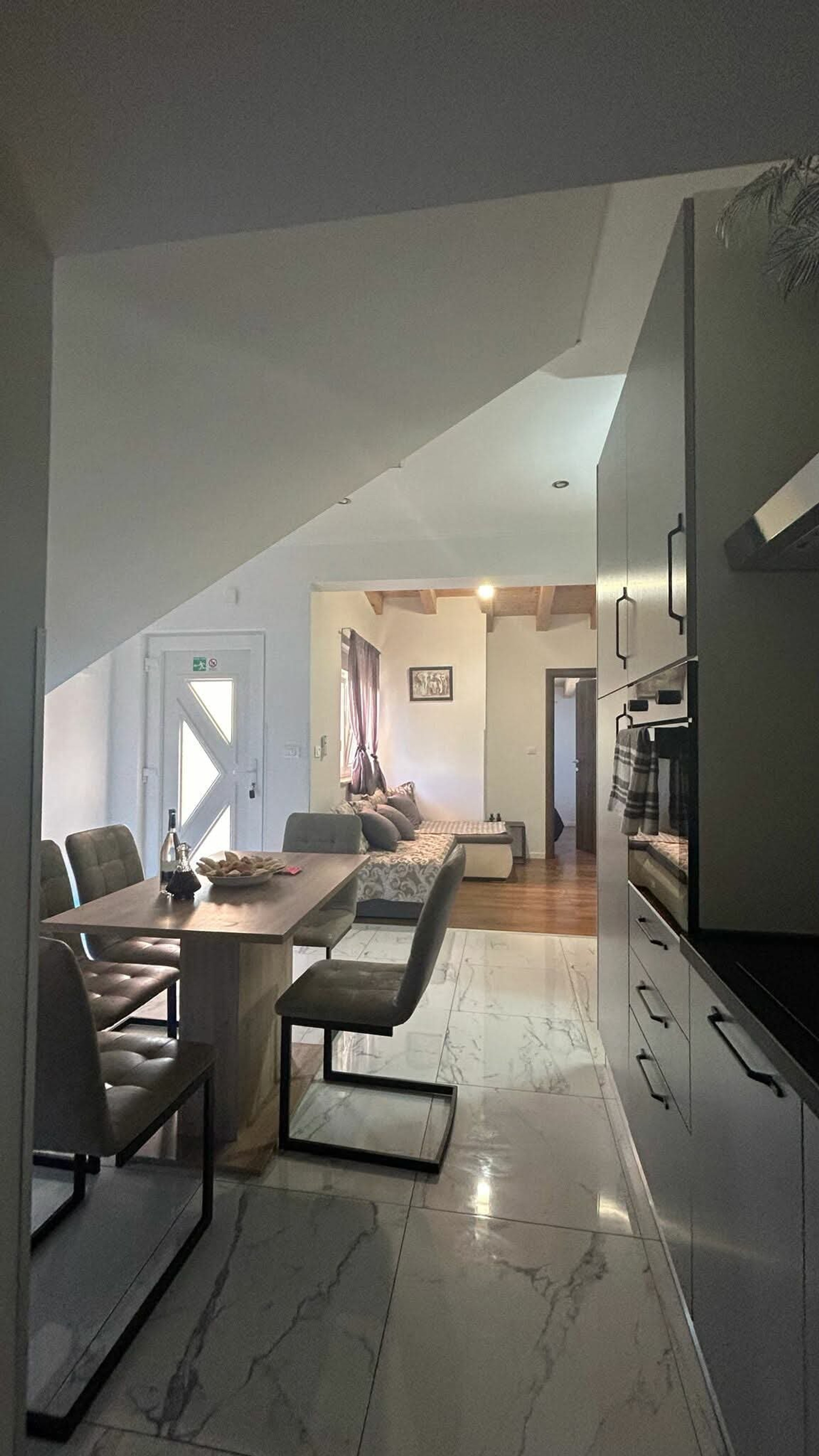 Kitchen and dining toward living room