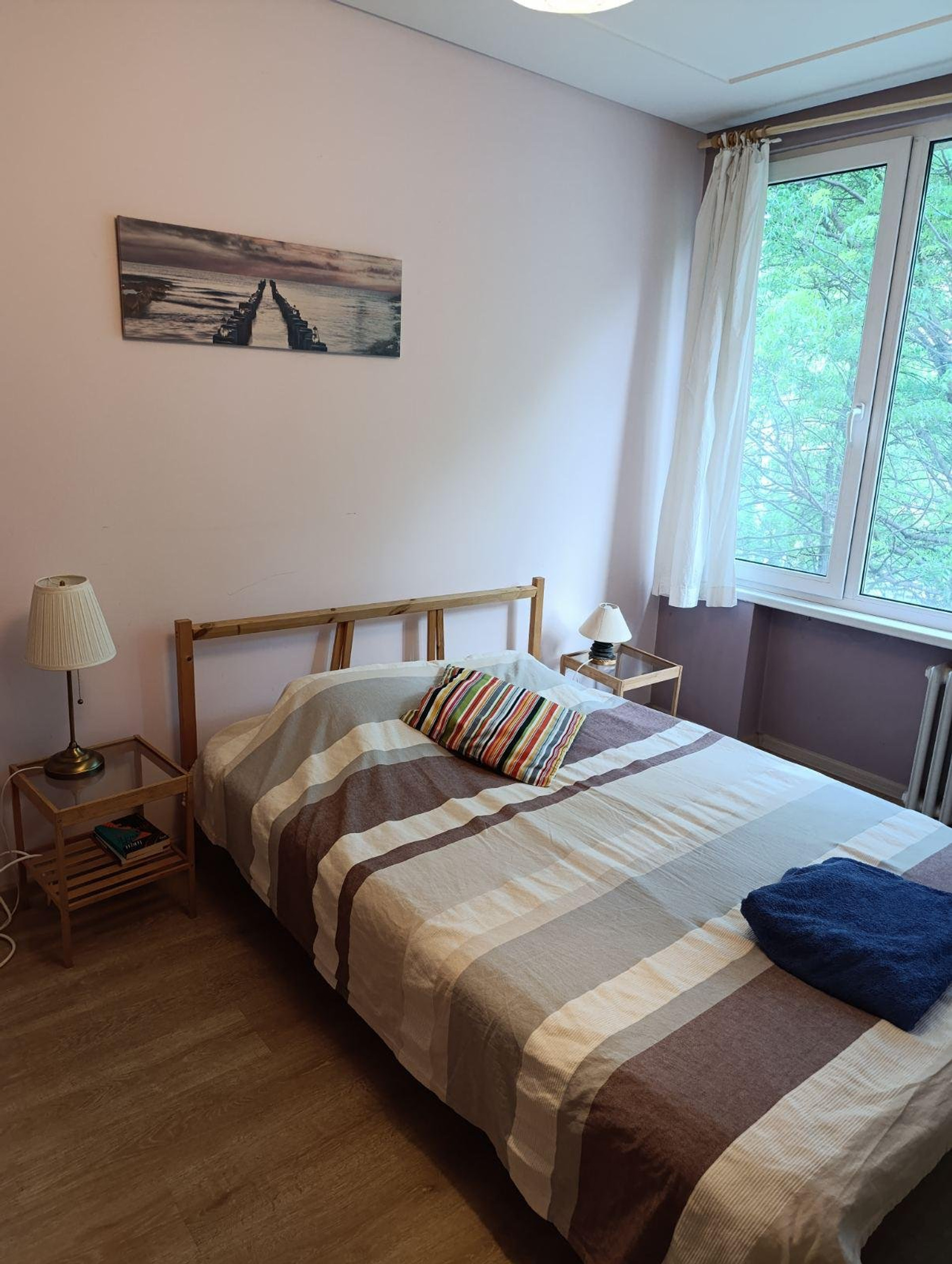 Quiet and cozy bedroom with a comfortable atmosphere, perfect for restful sleep and relaxation.