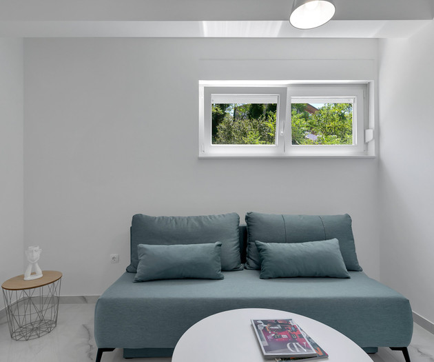 Living room seating with window view