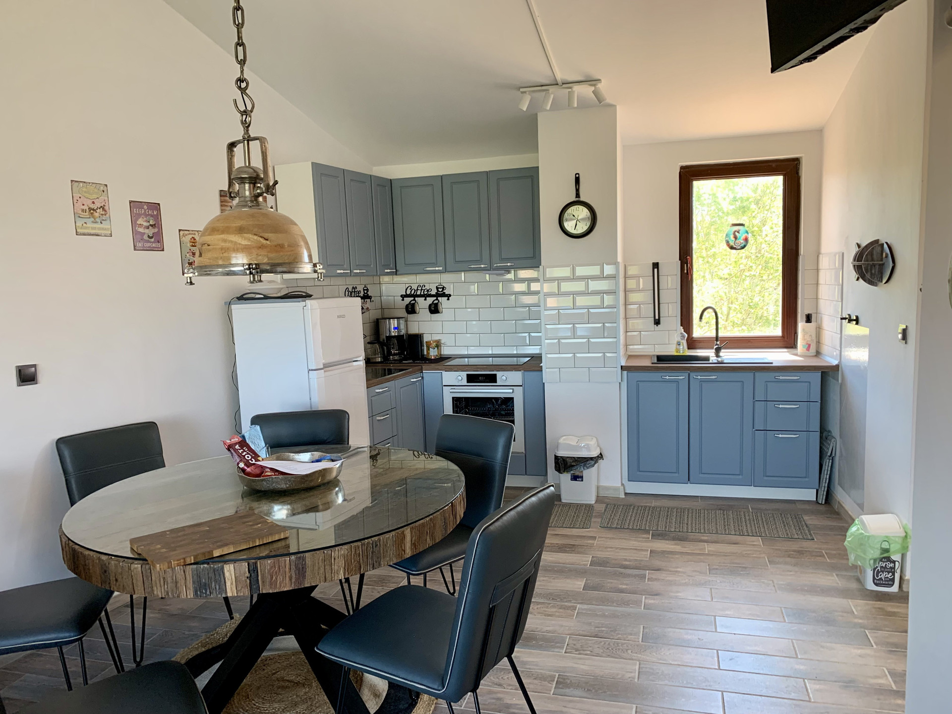 Kitchen dining with blue cabinets