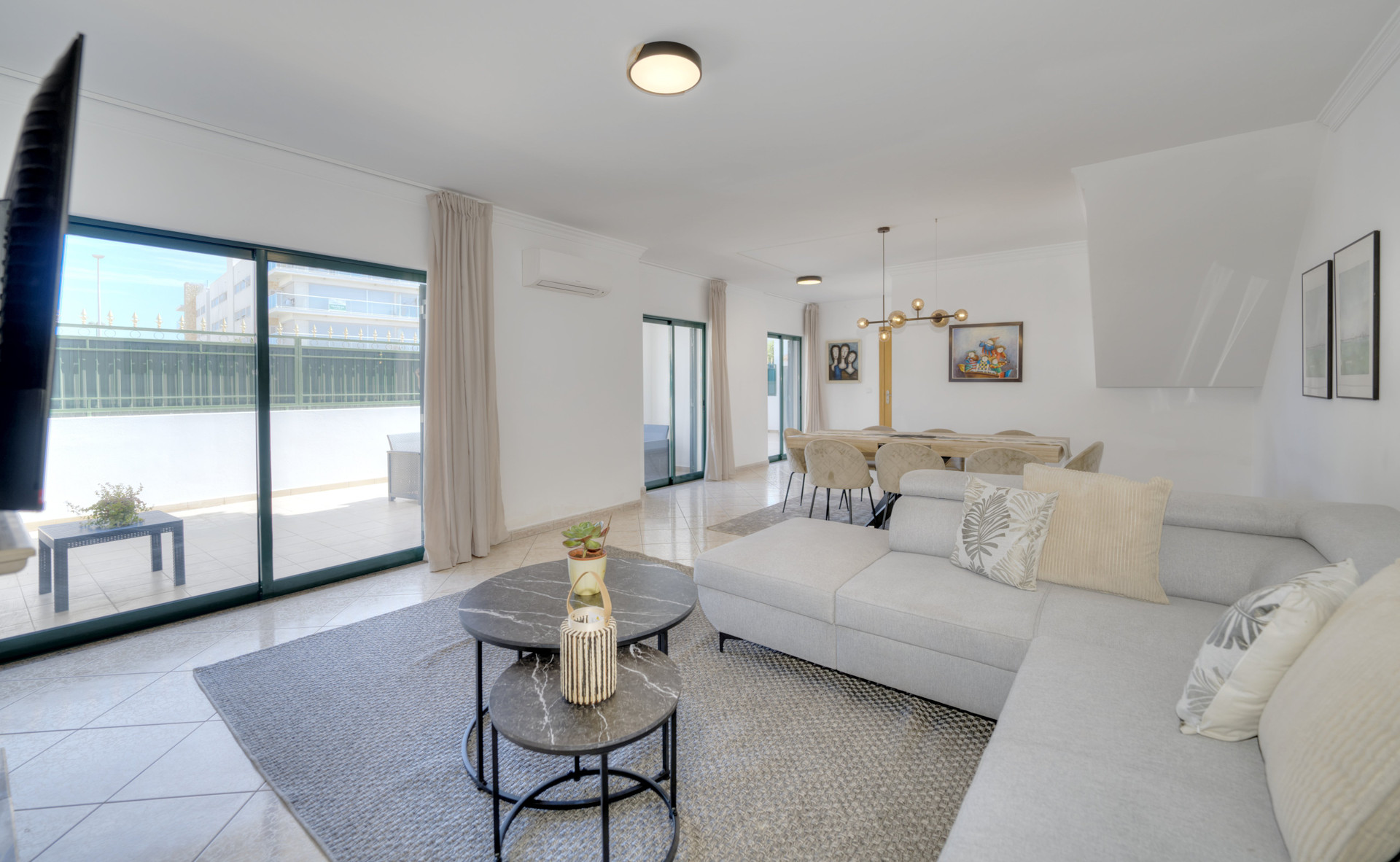 Bright living room with terrace access
