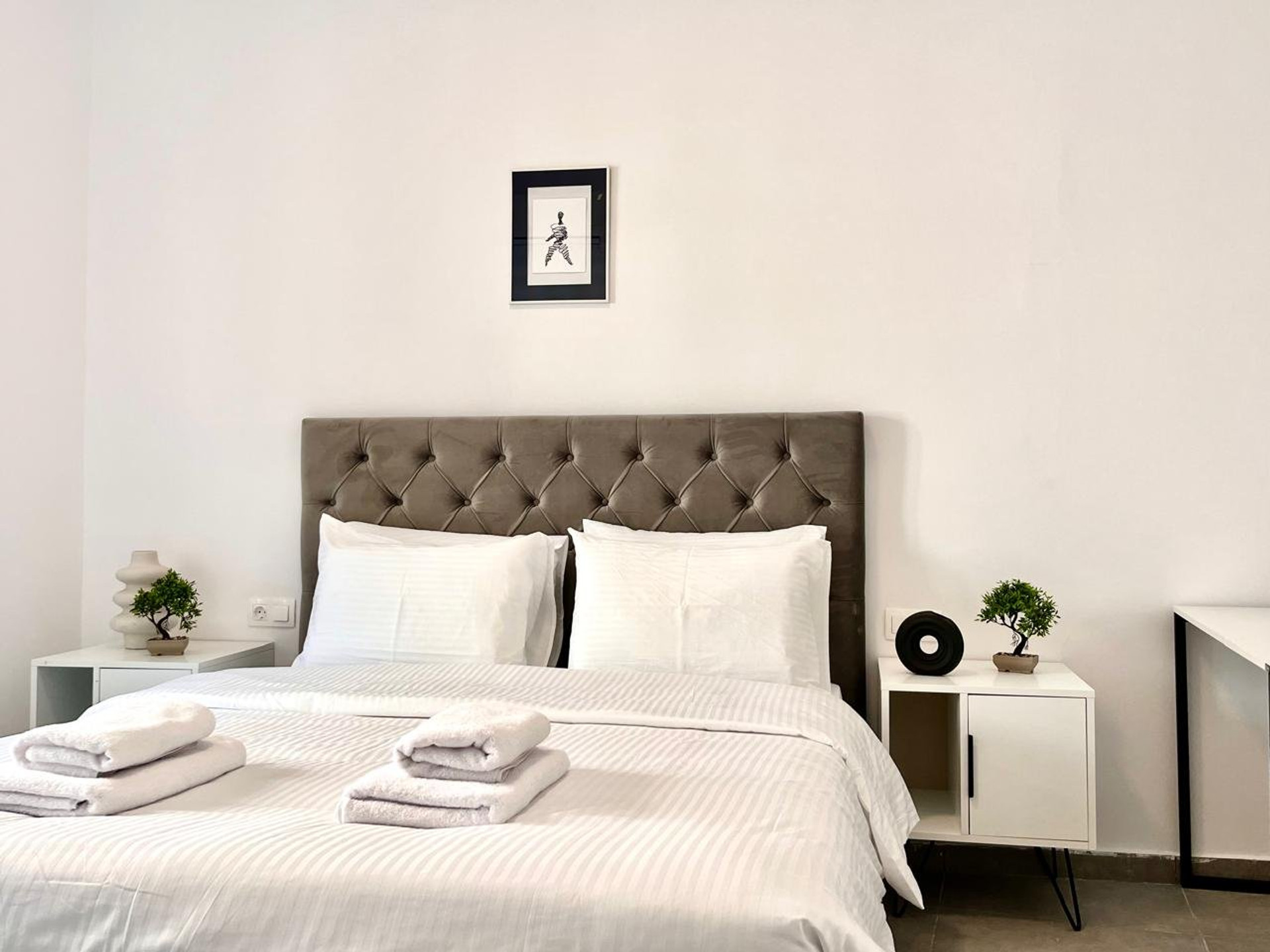 Bed with nightstands view