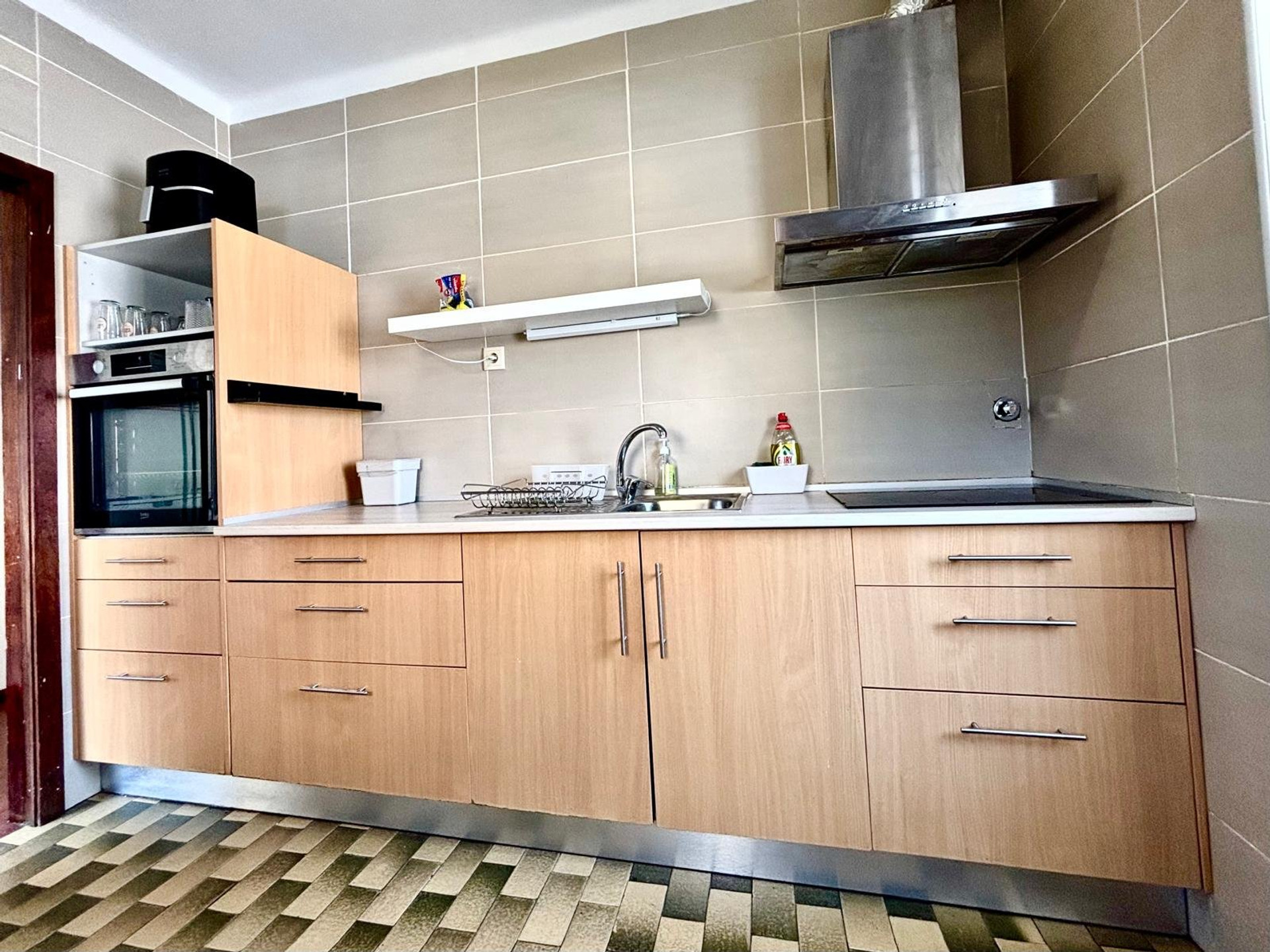 Kitchen with stove and oven