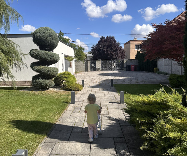 Garden path with person walking