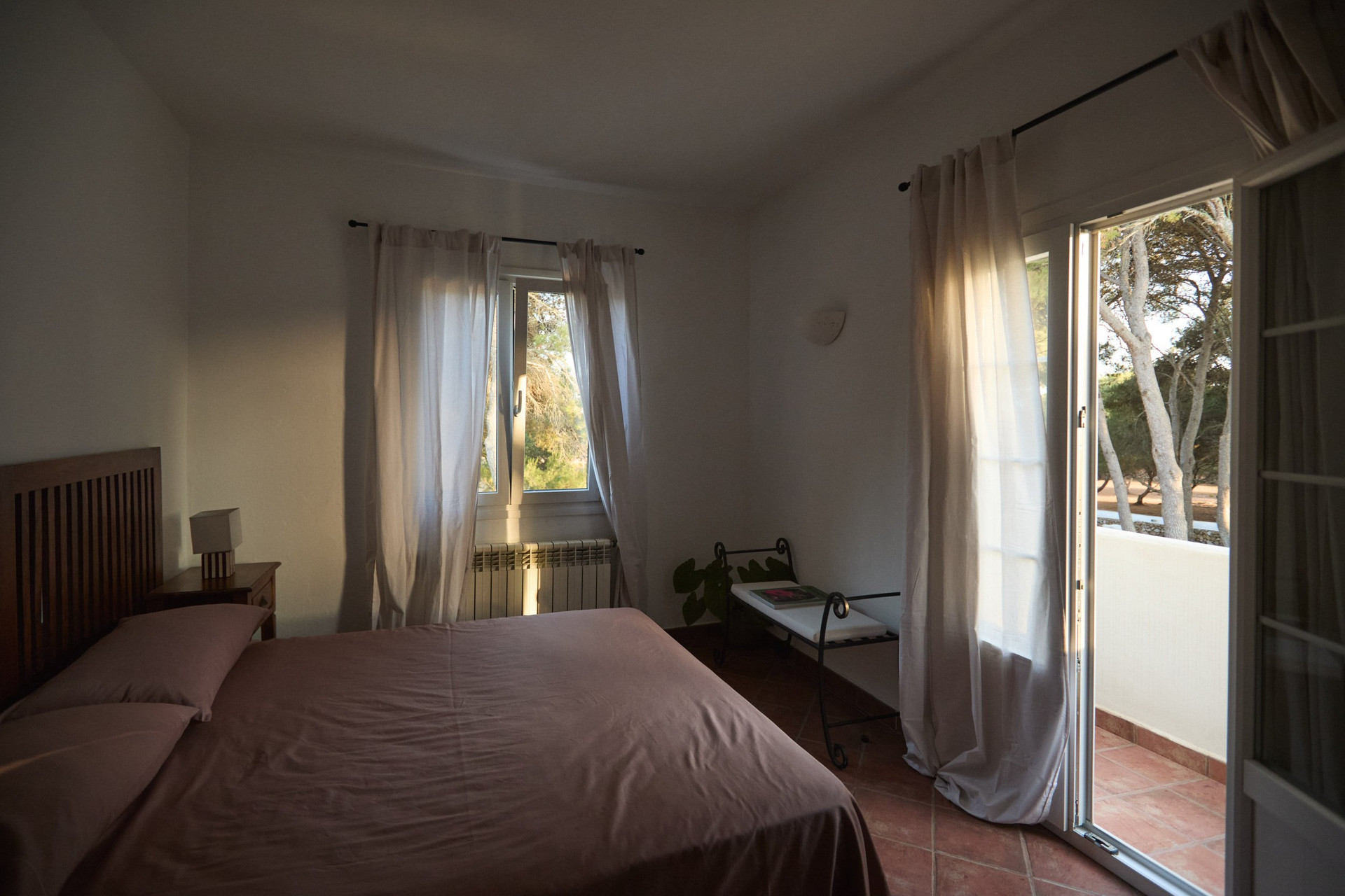 Bright bedroom with garden views