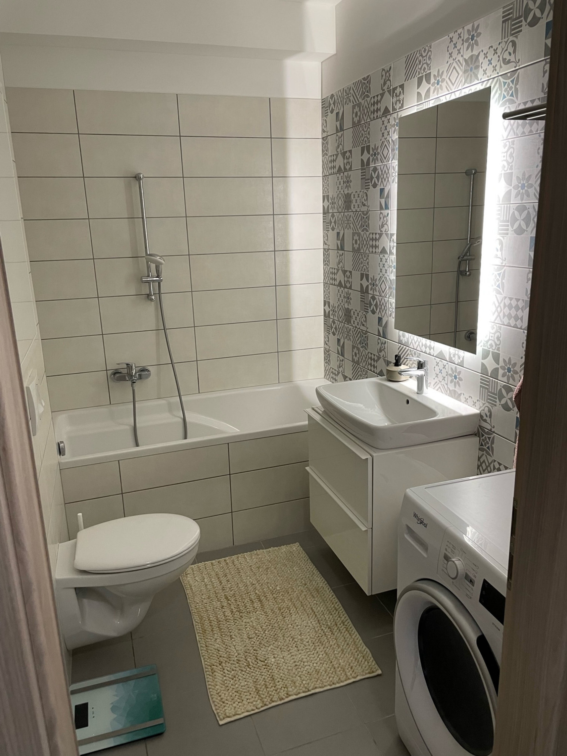 bathroom with design mirror