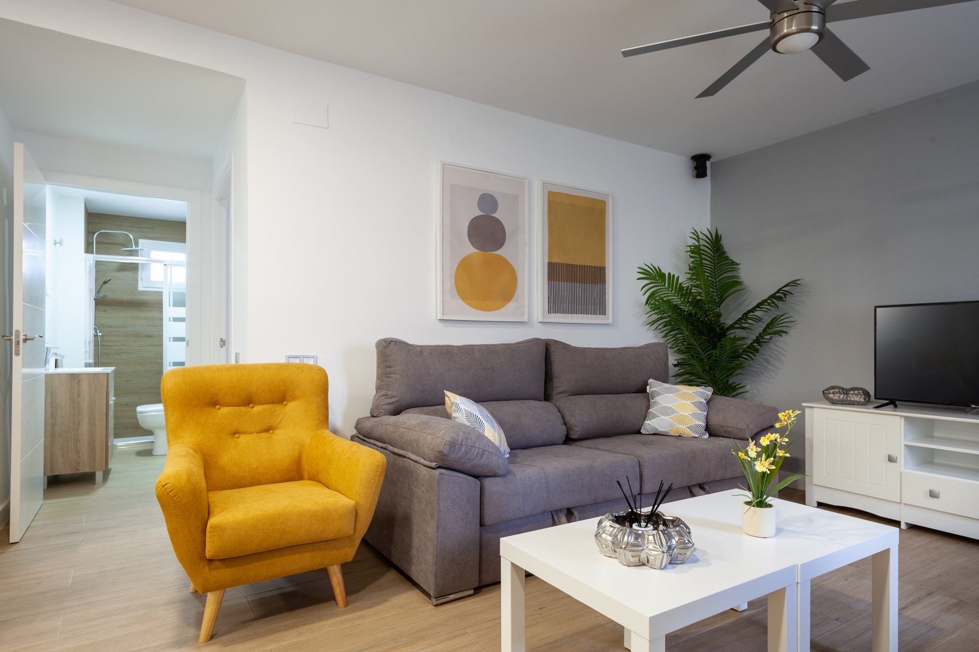 Living room with yellow armchair