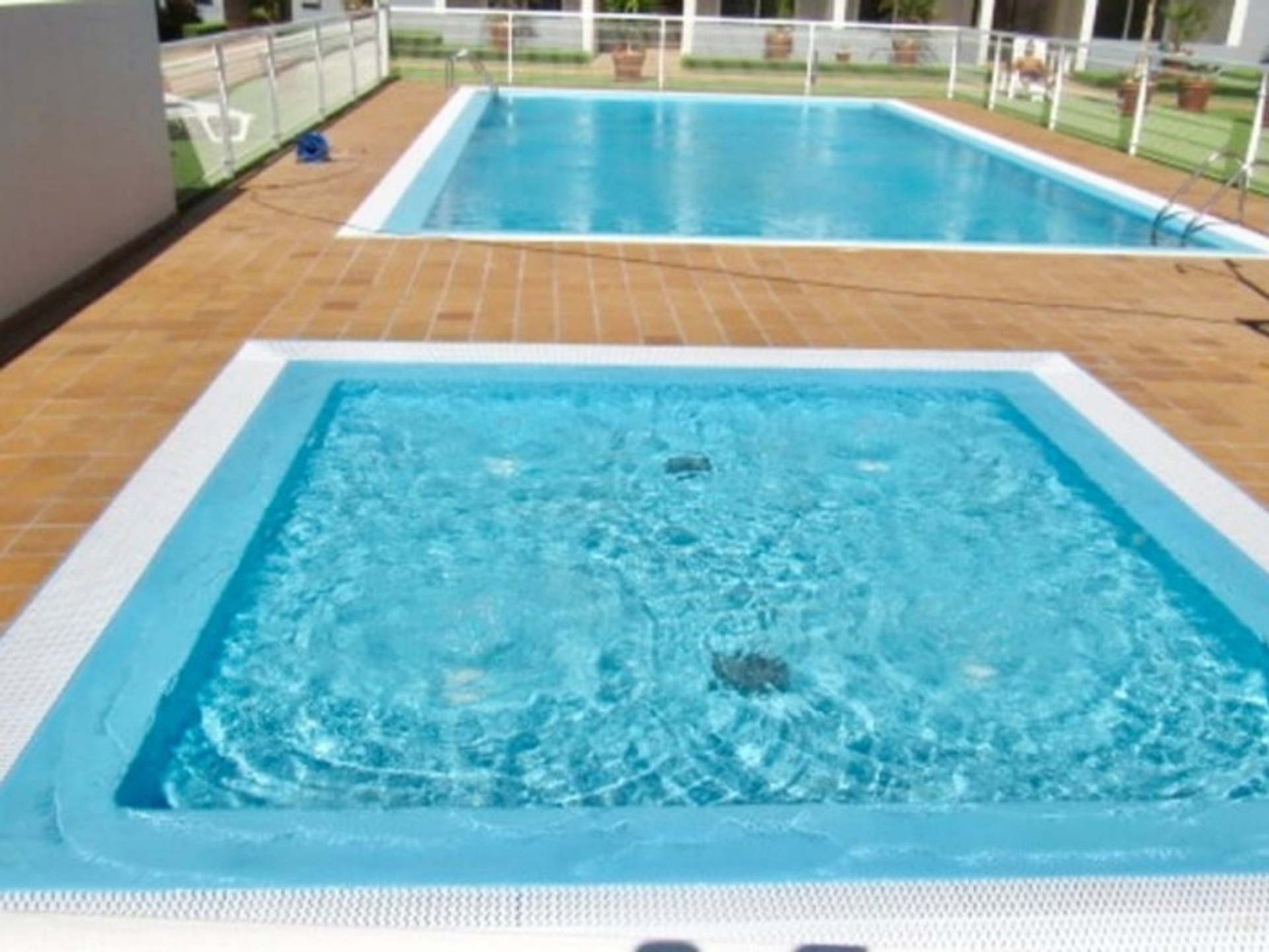 Outdoor pool and jacuzzi area