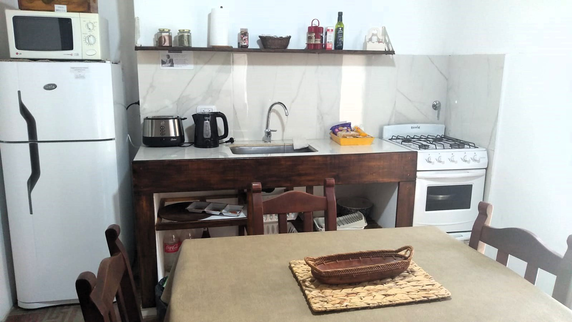 Kitchen with stove and sink