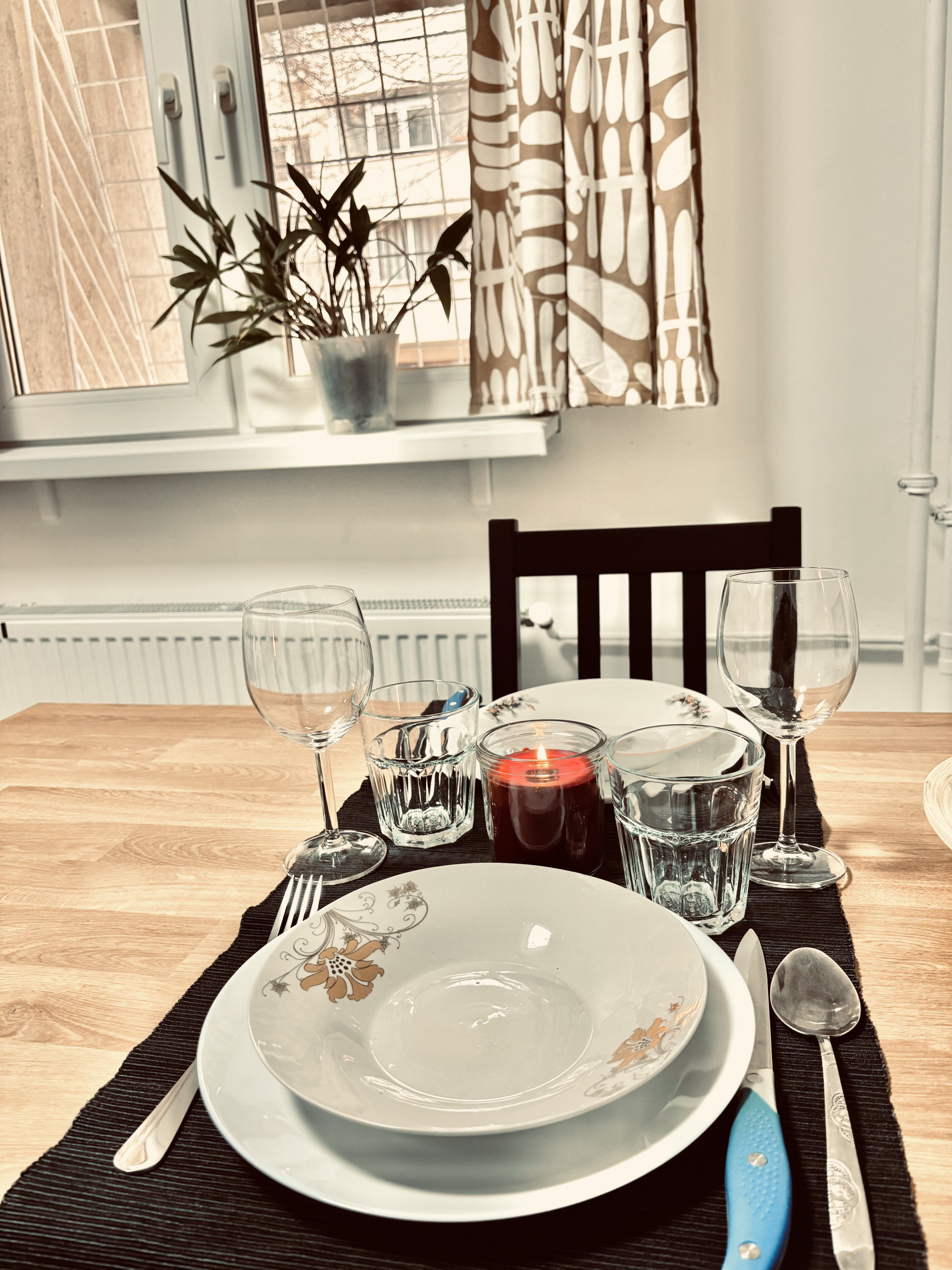 Set dining table by window