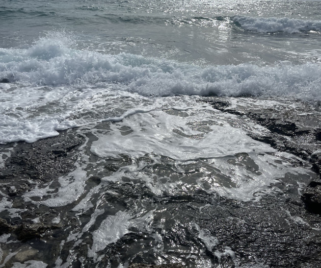Waves crashing on rocks