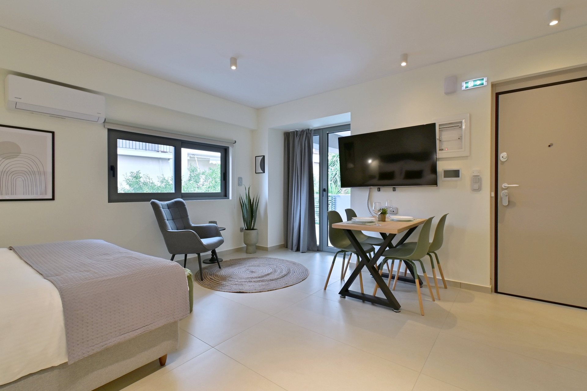 Bed, dining table and TV