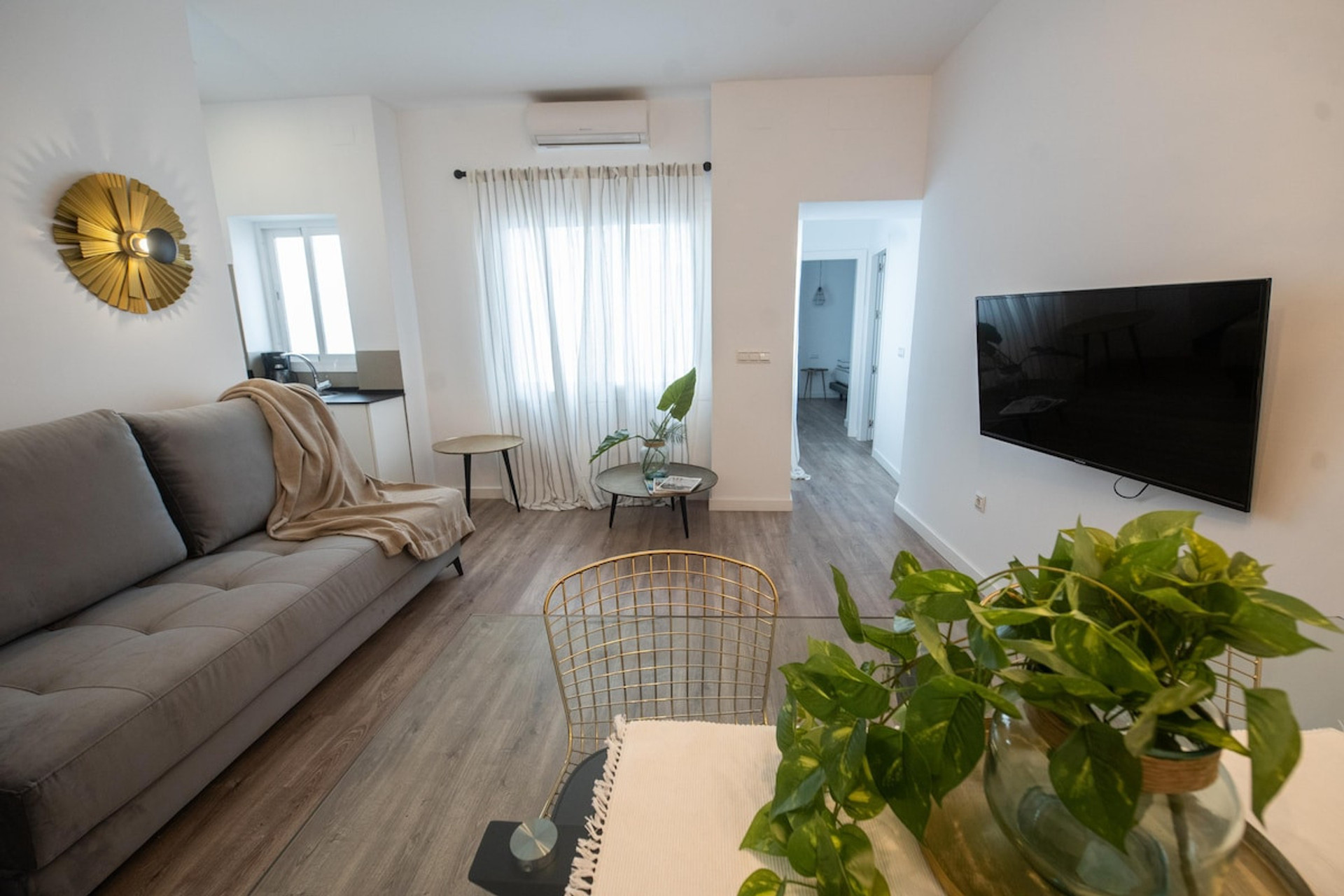 living area with TV and sofa bed